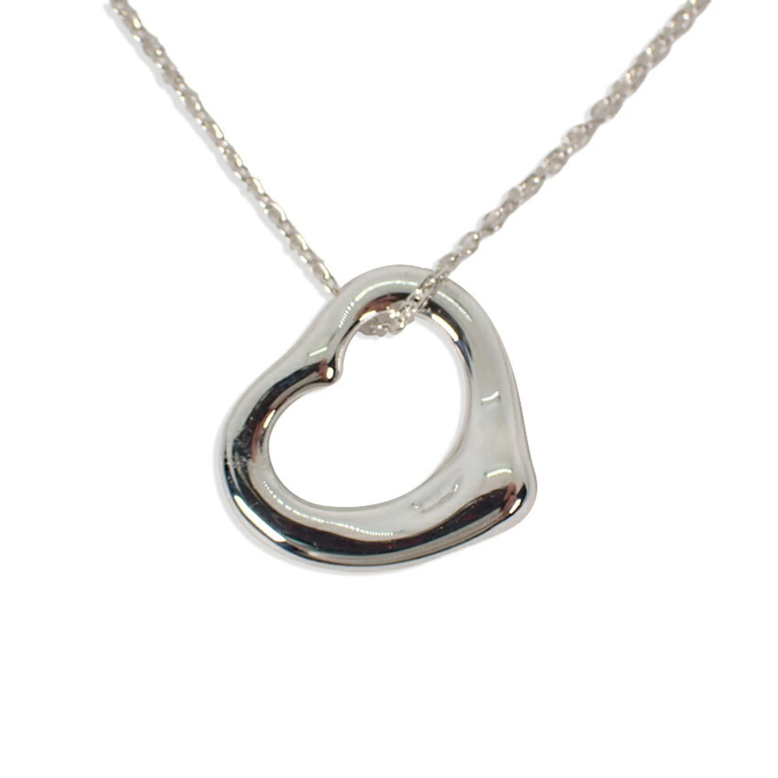 Tiffany & Co. 925 Heart Pendant Necklace: Tiffany & Co. 925 Heart Pendant Necklace Sterling silver 925, the Tiffany & Co. heart pendant necklace boasts elegant simplicity with its 14mm x 16mm design. Crafted from high-quality sterling