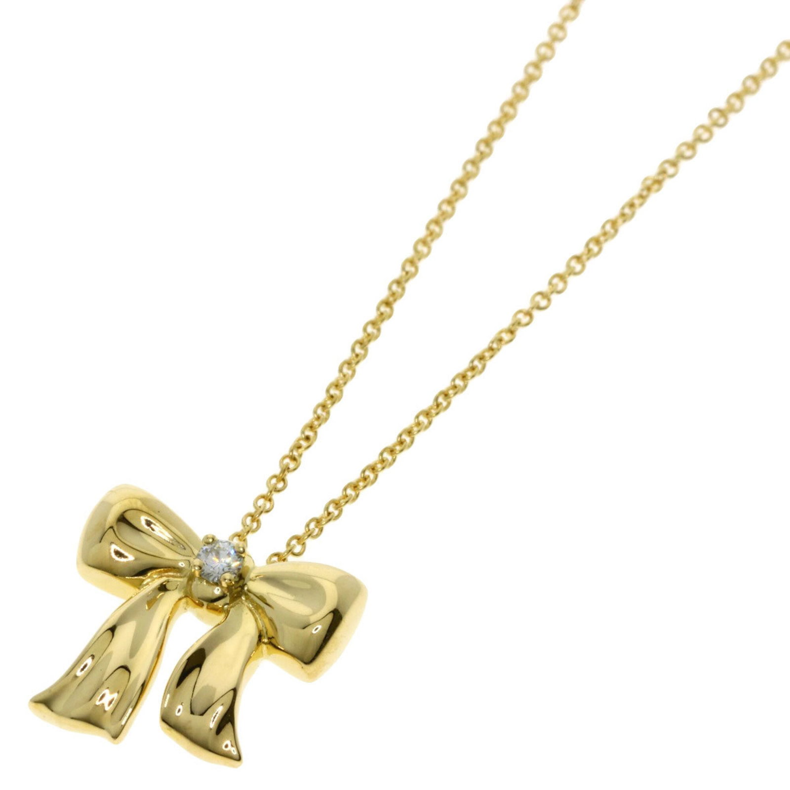 Tiffany & Co. Ribbon 1P Diamond Necklace 18K Yellow Gold Women'S.: Tiffany & Co. Ribbon 1P Diamond Necklace 18K Yellow Gold Women'S. Tiffany & Co. Ribbon 1P Diamond Necklace in 18K Yellow Gold boasts a stunning 13.1mm x 14.8mm diamond pendant set against an elegant