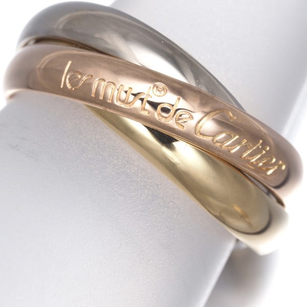Classic 3color 18k yellow rose gold trinity ring Cartier Eu54: Classic 3color 18k yellow rose gold trinity ring Cartier Eu54 The Cartier Eu54 classic trinity ring boasts a striking multi-tone design in 18k yellow gold, featuring a unique blend of white and rose