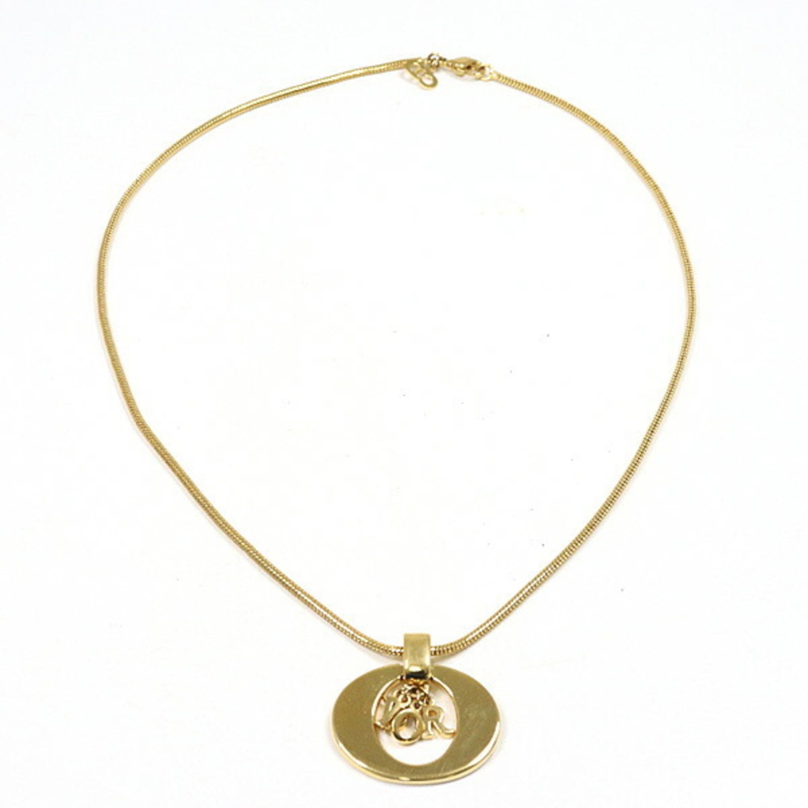 Gold Tone Metal Gold Color Christian Dior Necklace 46cm Costume: Gold Tone Metal Gold Color Christian Dior Necklace 46cm Costume Gold Tone Metal Gold Color Christian Dior Necklace with elegant 23.8mm x 30.6mm pendant and adjustable neck circumference of 45.8 cm /