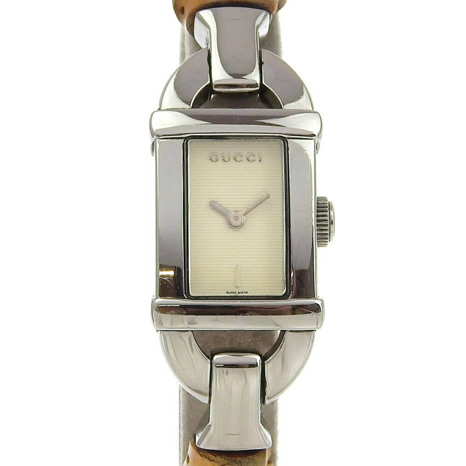 Gucci Wristwatch: Gucci Wristwatch Stainless steel case and bamboo band make for a unique combination in this Gucci wristwatch, available at 16mm diameter. The ivory-colored dial adds a touch of elegance to this