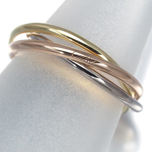 Cartier Ring Trinity 3Color Xs Eu49 18K 750 Yellow White Rose Gold: Cartier Ring Trinity 3Color Xs Eu49 18K 750 Yellow White Rose Gold Cartier's Trinity Ring, a masterpiece of multi-tonal design, boasts three distinct colors in 18k gold. The EU49 size ring features a