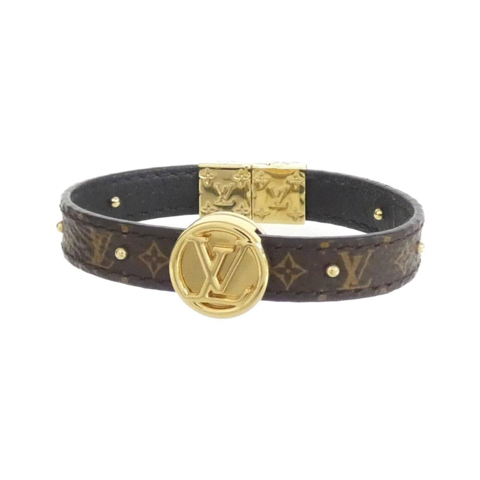 Canvas Leather Charm Bracelet by Louis Vuitton: Canvas Leather Charm Bracelet by Louis Vuitton Canvas Leather Charm Bracelet by Louis Vuitton features a unique combination of canvas and calf leather, with a signature maroon color. The bracelet