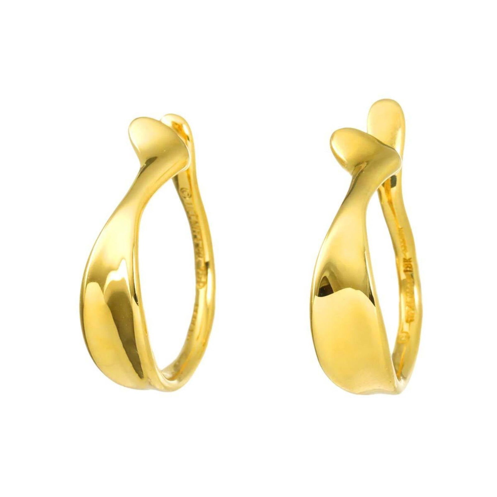 Tiffany Earcuff Yellow Gold (18K): Tiffany Earcuff Yellow Gold (18K) Yellow gold (18K) Tiffany earcuff with sleek design and refined details. Measuring 28.40mm x 7.20mm, this elegant piece adds a touch of sophistication to any outfit.