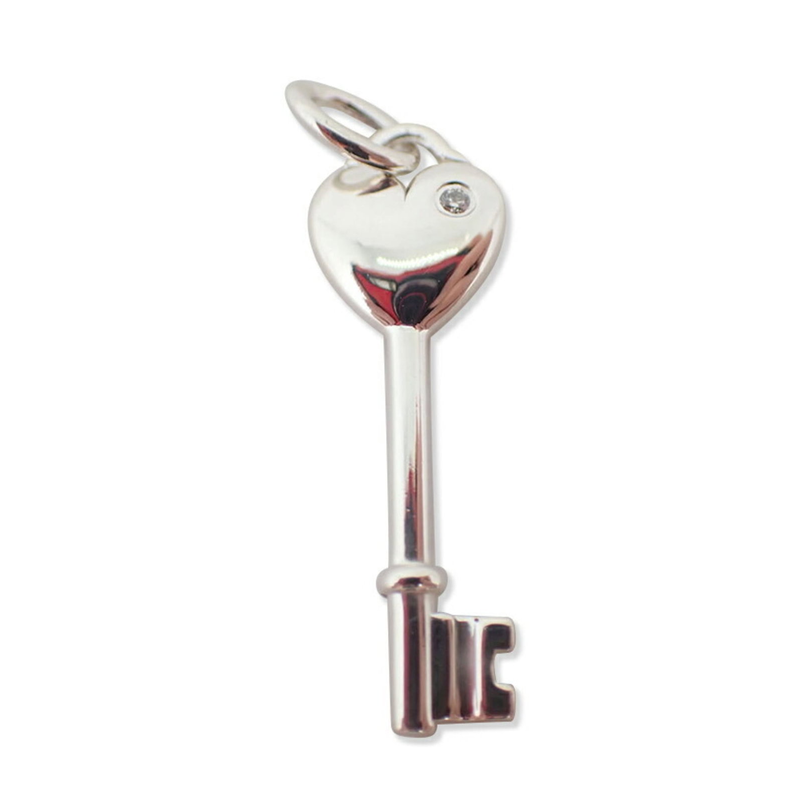 Diamond Pendant Key 925 Heart Top Tiffany: Diamond Pendant Key 925 Heart Top Tiffany Sterling silver pendant in the iconic Tiffany heart shape, crafted from 925 material. This elegant key-shaped design features a subtle shine and a touch of so