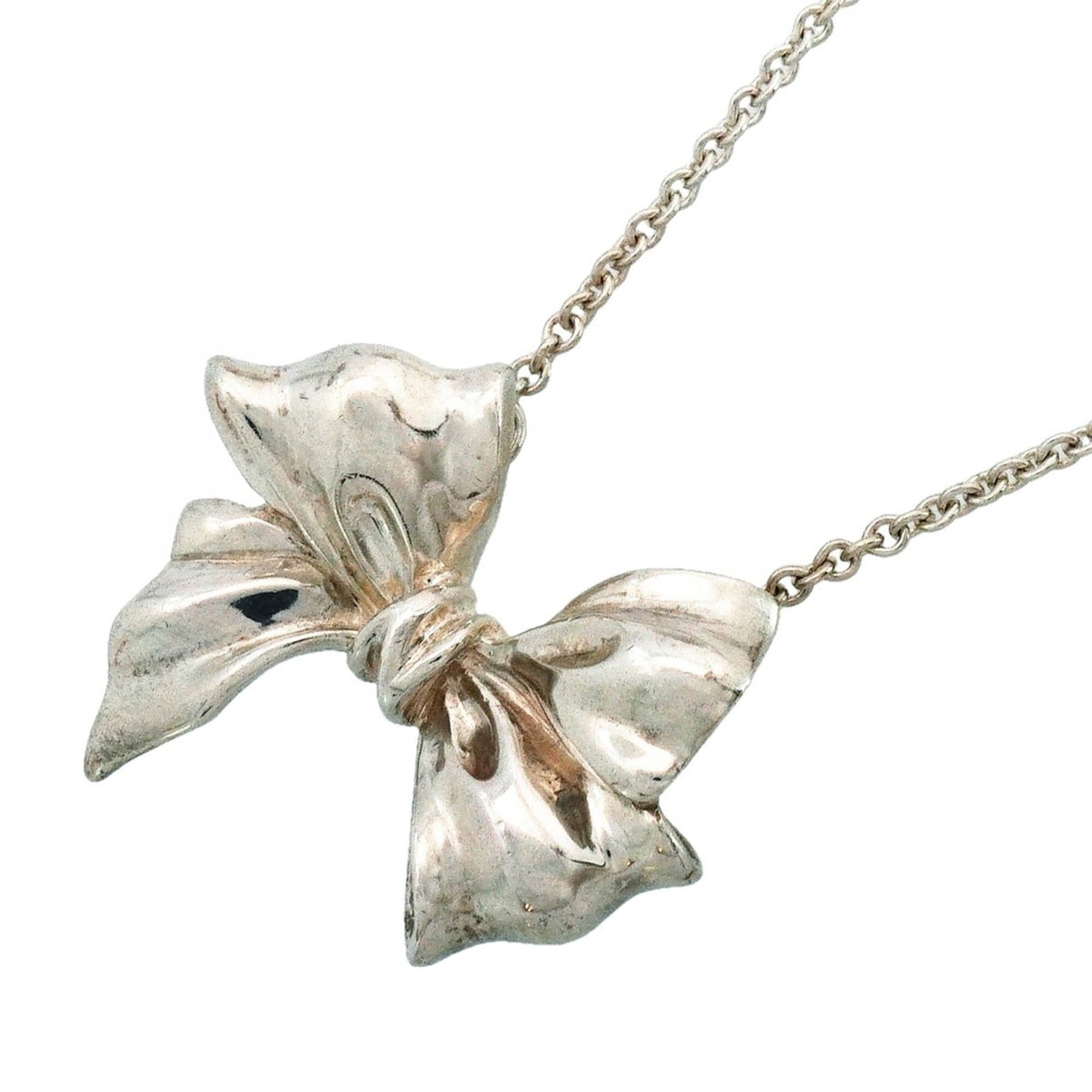 Silver Sterling Ribbon Necklace For Women's By Tiffany: Silver Sterling Ribbon Necklace For Women's By Tiffany Silver Sterling Ribbon Necklace For Women's By Tiffany features a sleek and modern design, with a silver sterling ribbon necklace made from high-