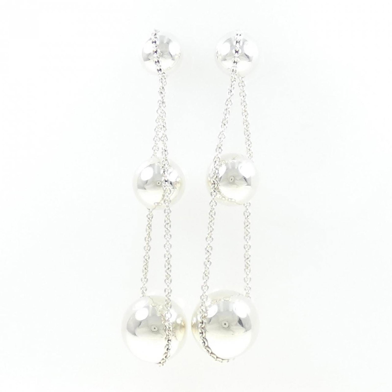 Silver 925 Tiffany Drop Earrings: Silver 925 Tiffany Drop Earrings Silver 925 Tiffany Drop Earrings are crafted from high-quality silver, weighing 8.2g each. Measuring 68.10mm in height and 15.30mm in width, these drop earrings