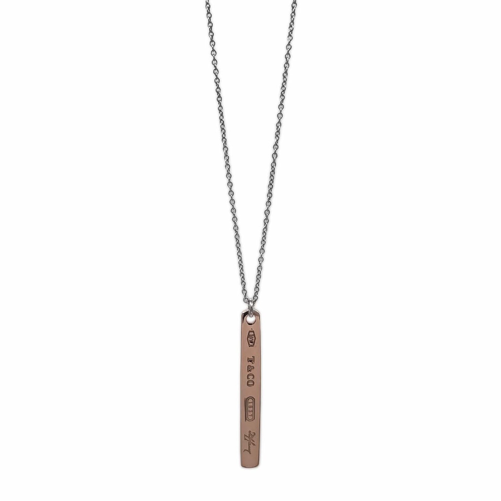 Tiffany & Co. 1837 Narrow Bar Necklace Pendant Sv925 Rubedo Metal Gold Women'S: Tiffany & Co. 1837 Narrow Bar Necklace Pendant Sv925 Rubedo Metal Gold Women'S Tiffany & Co.'s 1837 Narrow Bar Necklace Pendant is a stunning piece featuring Rubedo metal gold. The necklace boasts a