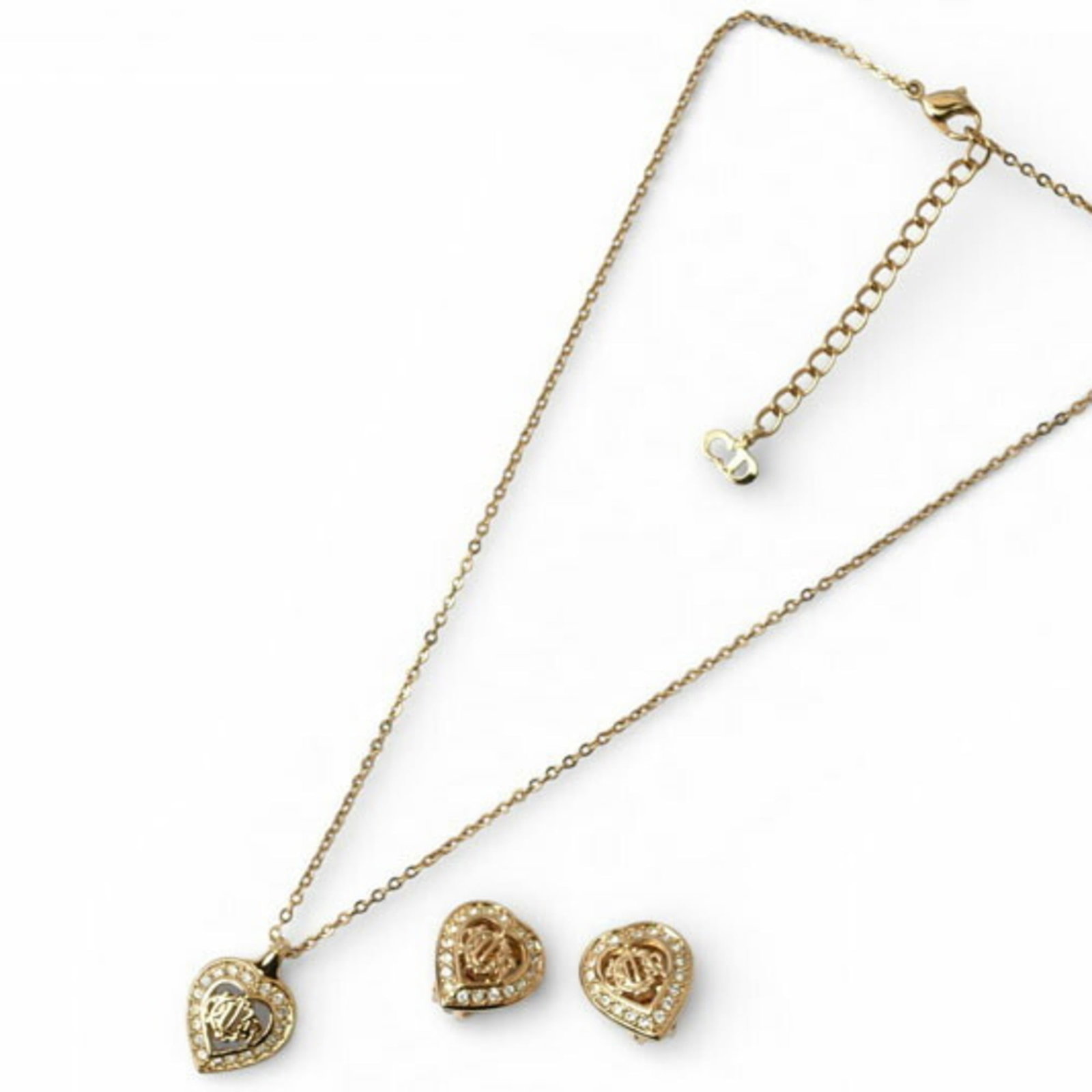 Christian Dior Necklace And Earring Set Pendant With Rhinestones Gold: Christian Dior Necklace And Earring Set Pendant With Rhinestones Gold Christian Dior Necklace and Earring Set with Rhinestones in Gold Plating. This elegant necklace pendant features rhinestones in