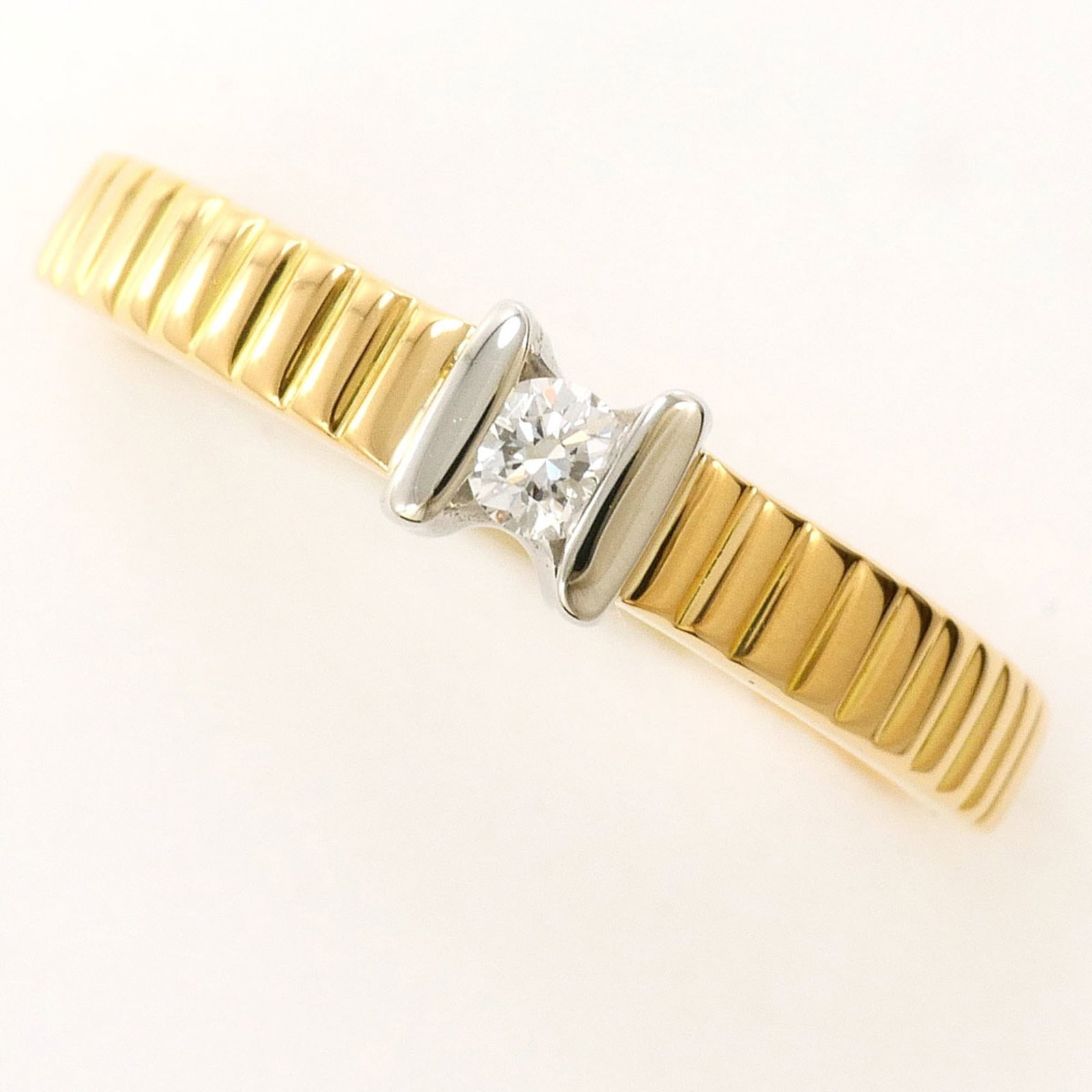 Platinum 900 18K Unbranded Gold Yellow Band Ring: Platinum 900 18K Unbranded Gold Yellow Band Ring Platinum 900 18K Unbranded Gold Yellow Band Ring features a striking combination of platinum and yellow gold, with a diamond weighing 0.08 carats set