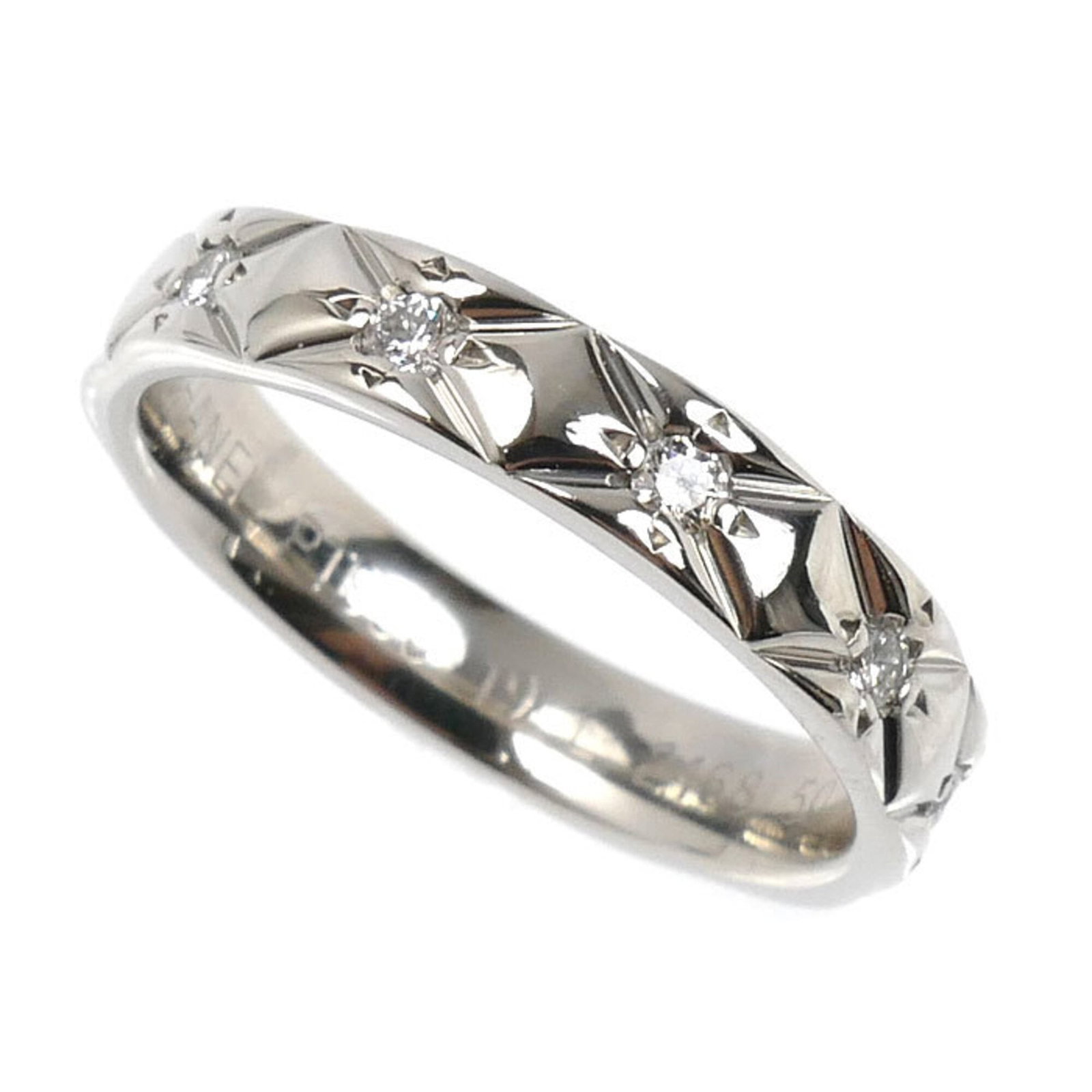 Ring in platinum 950 by Chanel: Ring in platinum 950 by Chanel Platinum band ring from Chanel, featuring diamond stone and made in France. This 50 US size 5.5 ring showcases the luxury brand's signature style with a touch of