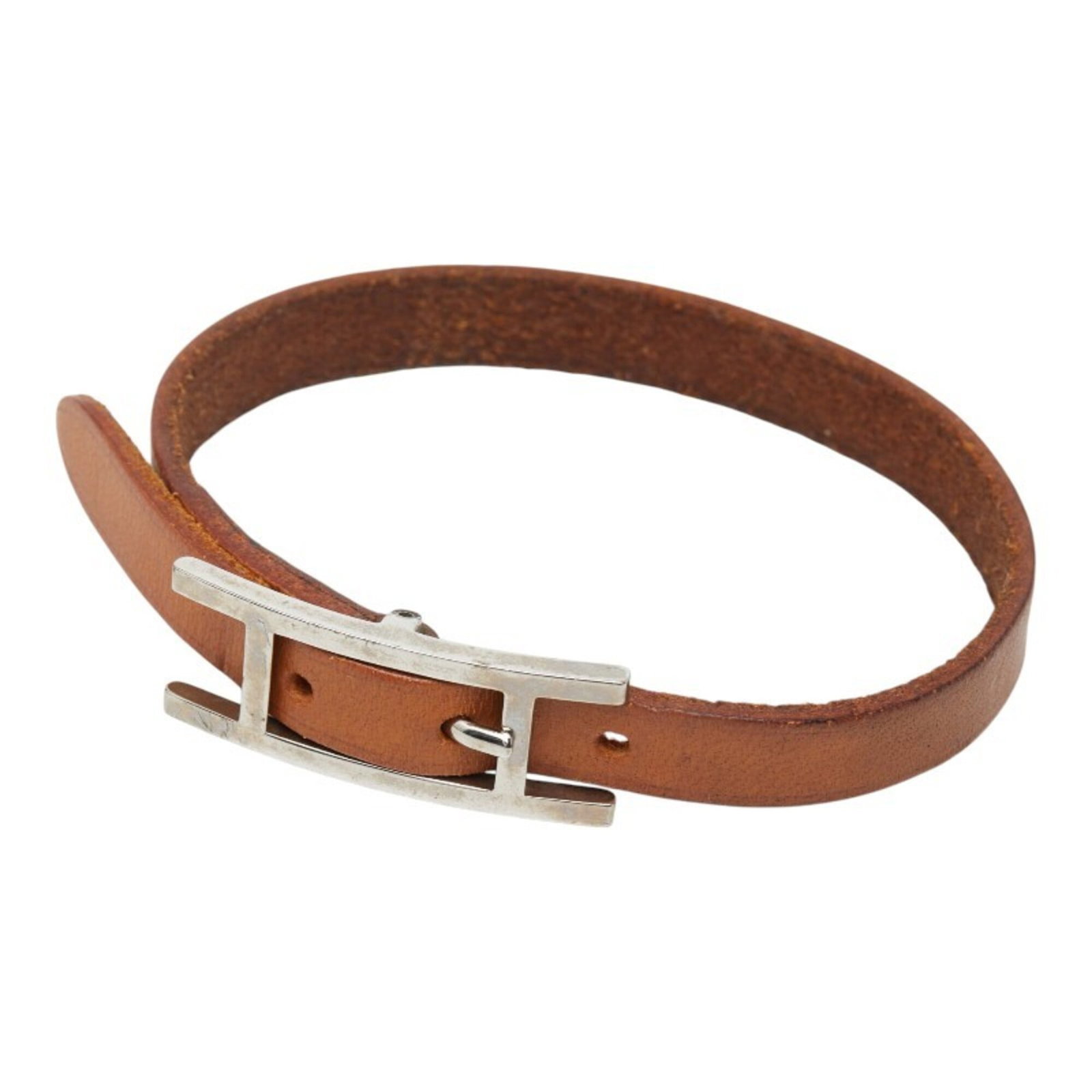 Hermes Leather Charm Bracelet: Hermes Leather Charm Bracelet Brown leather charm bracelet from Hermes, measuring 18cm in length. The classic design features high-quality leather material and a timeless style that suits women's