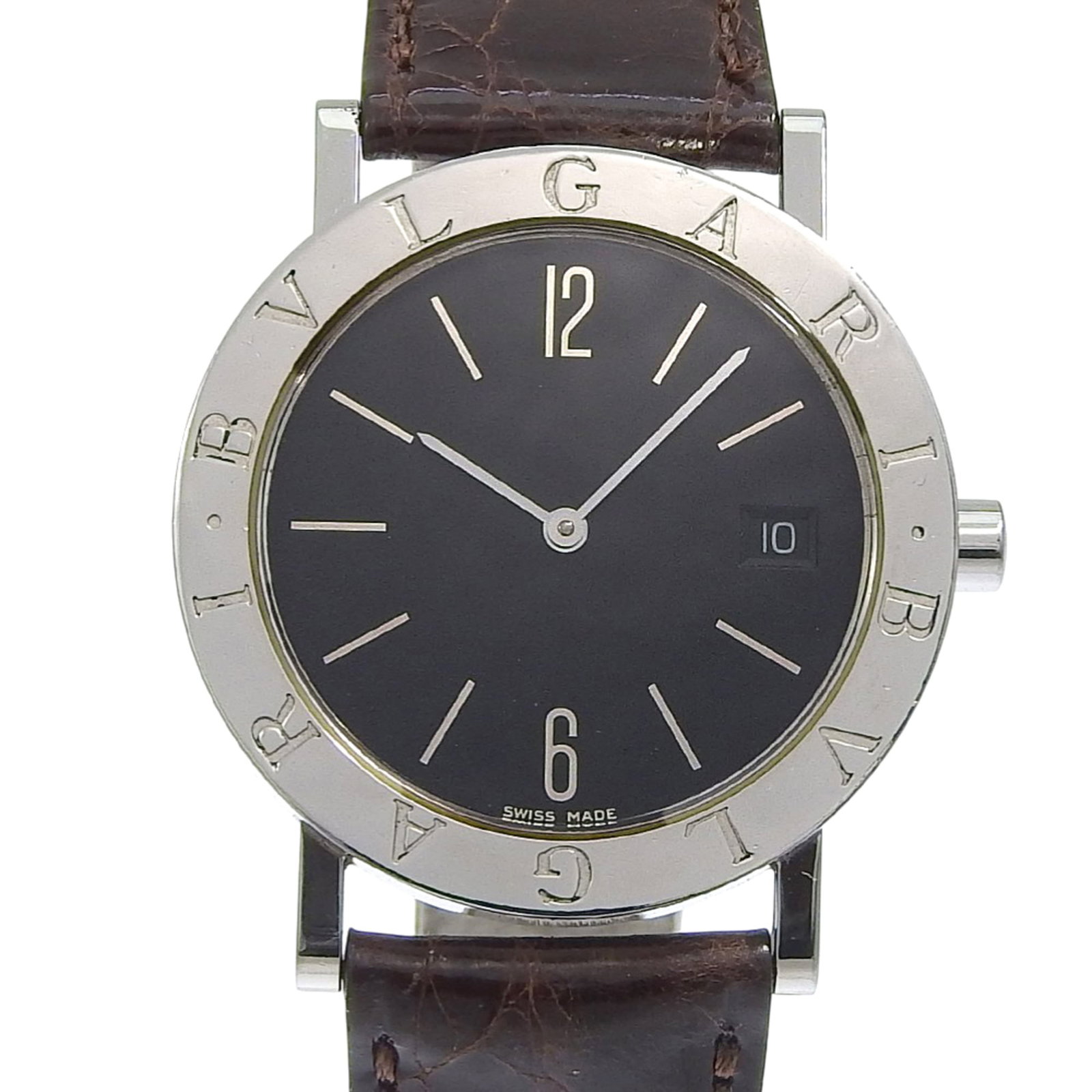 Bvlgari Wristwatch: Bvlgari Wristwatch Stainless steel case and leather band make for a sleek, versatile timepiece. This Bvlgari quartz wristwatch boasts a black dial and measures 33mm in diameter, suitable for wrists