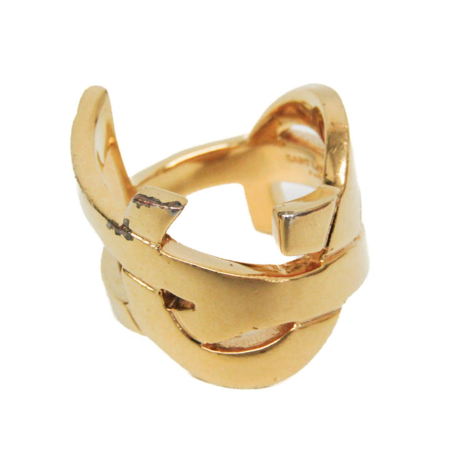 Saint Laurent Metal Band Ring Yves: Saint Laurent Metal Band Ring Yves The Saint Laurent Metal Band Ring Yves boasts a sleek, gold metal design with a twist. This fashion-forward band ring features a sturdy weight of 60g and measures