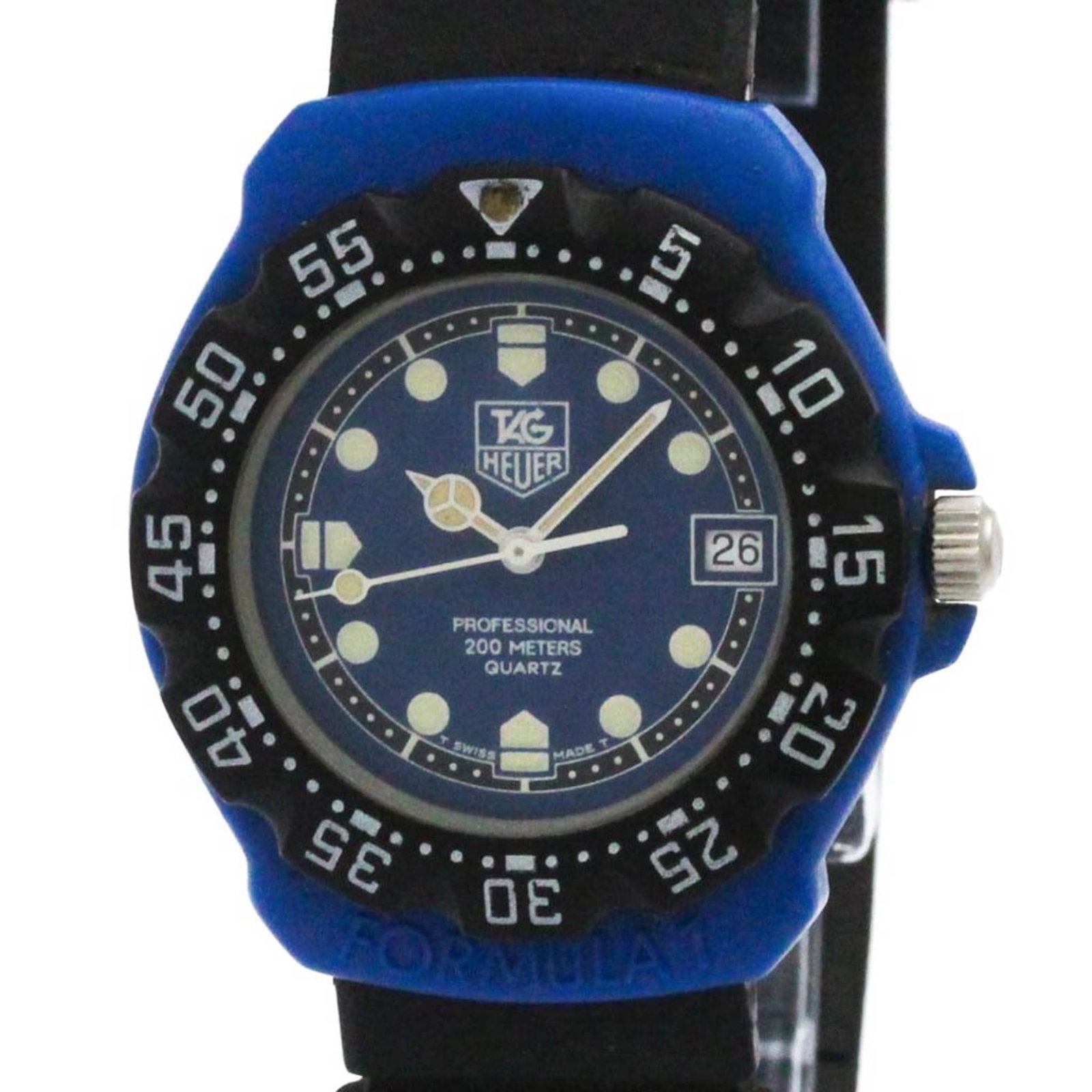Wristwatch From Tag: Wristwatch From Tag The Tag Heuer Formula 1 watch features a sporty design with a rubber case and band, making it a stylish accessory for everyday wear. Its blue dial stands out against the neutral