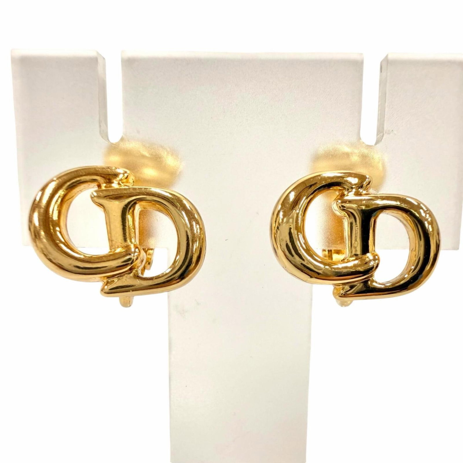 Clip earrings by Christian Dior: Clip earrings by Christian Dior Item Specifics: Brand: Christian Dior Type: Clip earrings Gender: Women Color: Gold Size (HxWxD): 10.00mm x 14.00mm / 0.39'' x 0.55'' Product Disclaimer: Items may