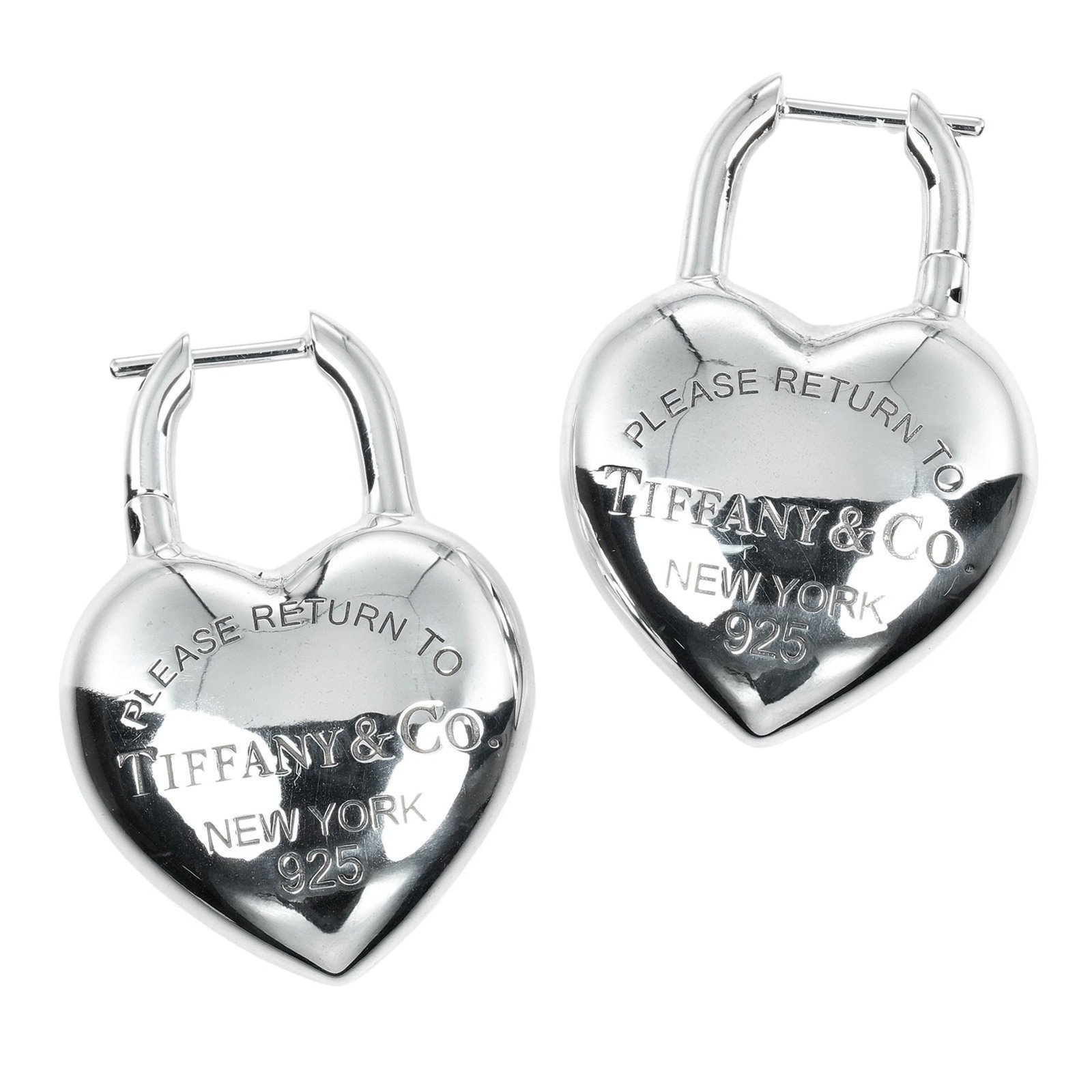 Tiffany Stud Earrings Silver 925: Tiffany Stud Earrings Silver 925 Silver 925 stud earrings from Tiffany, showcasing a sleek and modern design. Made from high-quality silver with a distinctive finish, these earrings are a classic choi