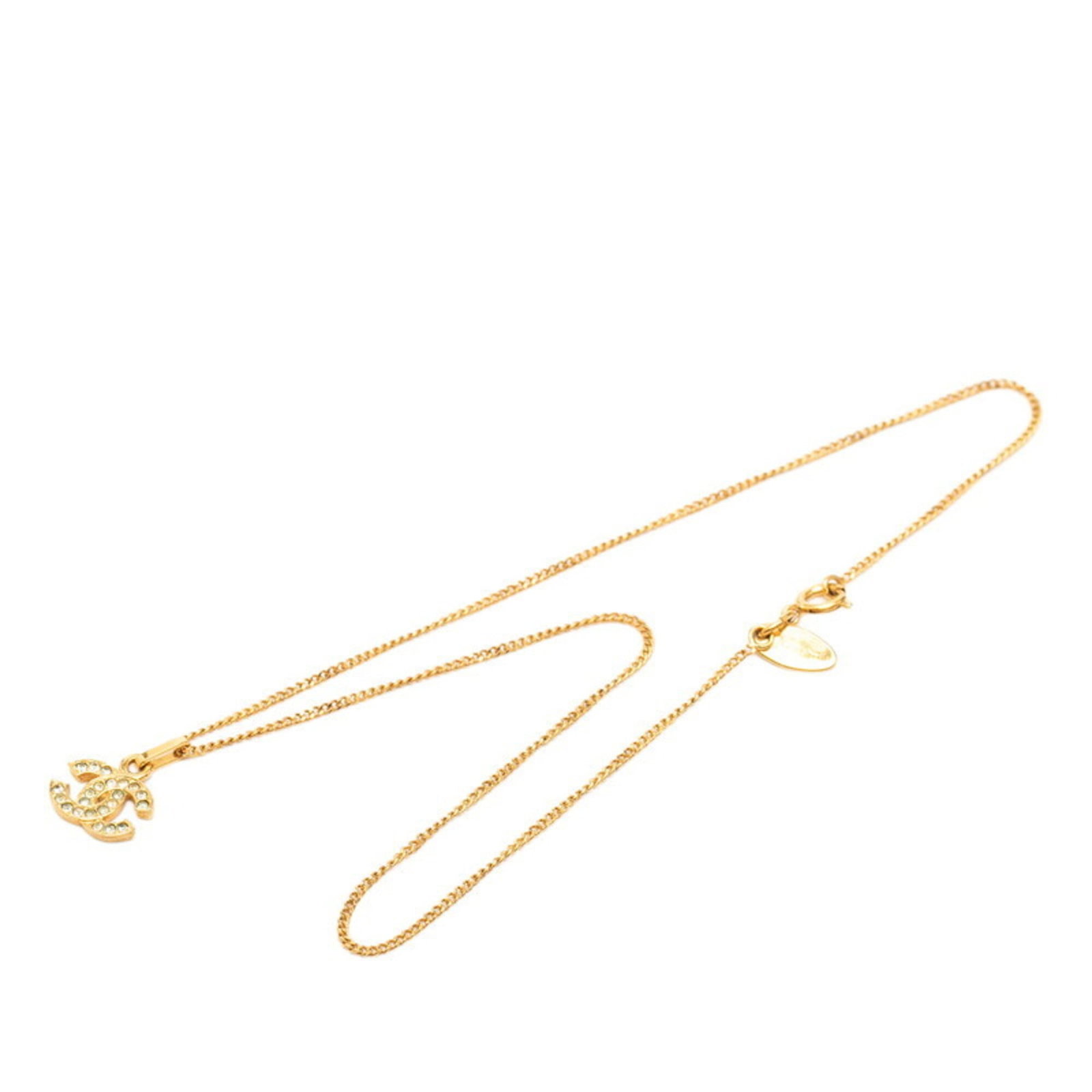 Chanel Coco Mark Necklace Gold And Green Plated Rhinestones Women'S Chanel: Chanel Coco Mark Necklace Gold And Green Plated Rhinestones Women'S Chanel Gold and green plated rhinestones adorn the Chanel Coco Mark Necklace, adding a touch of luxury to any outfit. The gold