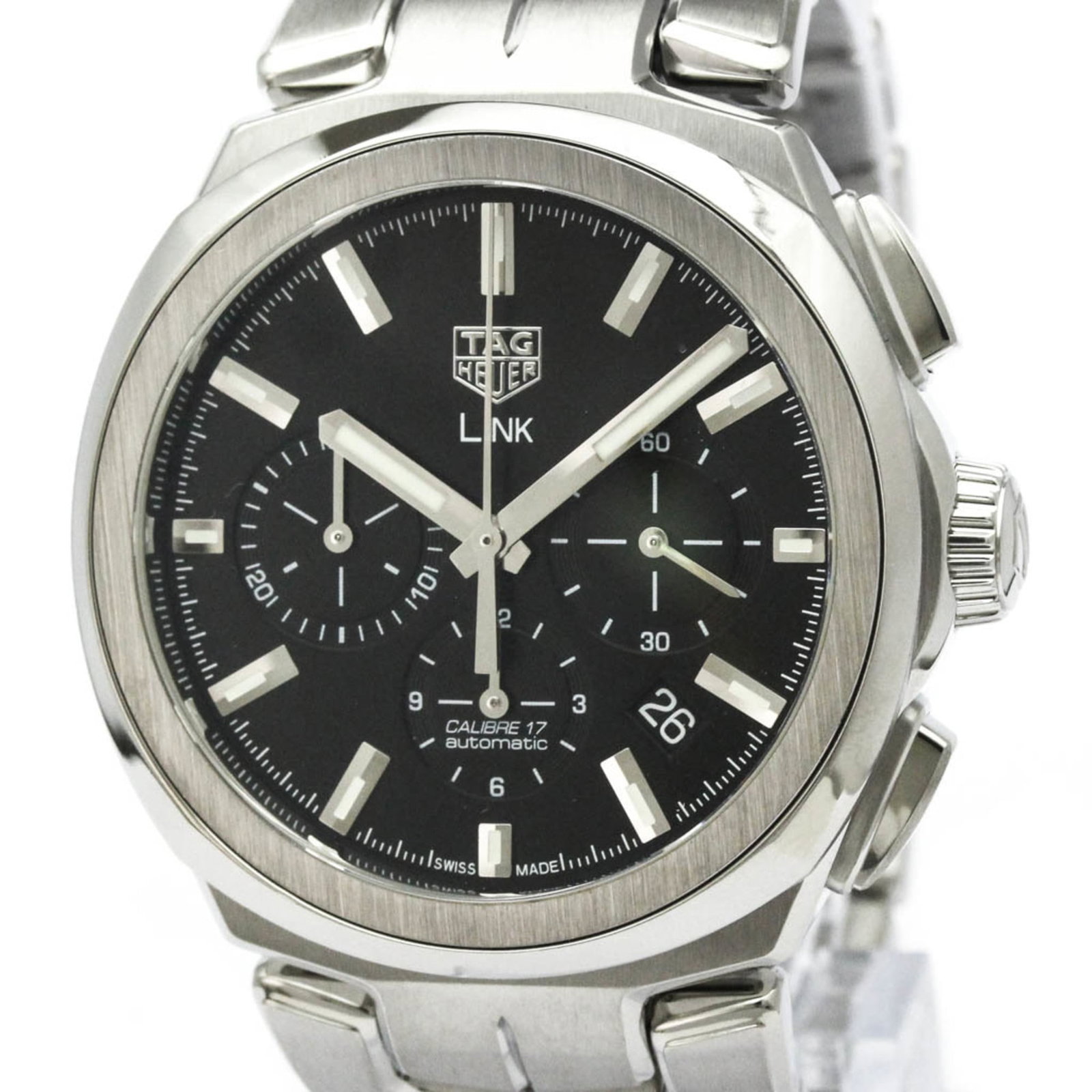 Wristwatch From Tag: Wristwatch From Tag Stainless steel case and band, the Tag Heuer Link watch exudes classic elegance with its black dial. Powered by a self-winding automatic movement, it features chronograph and date 