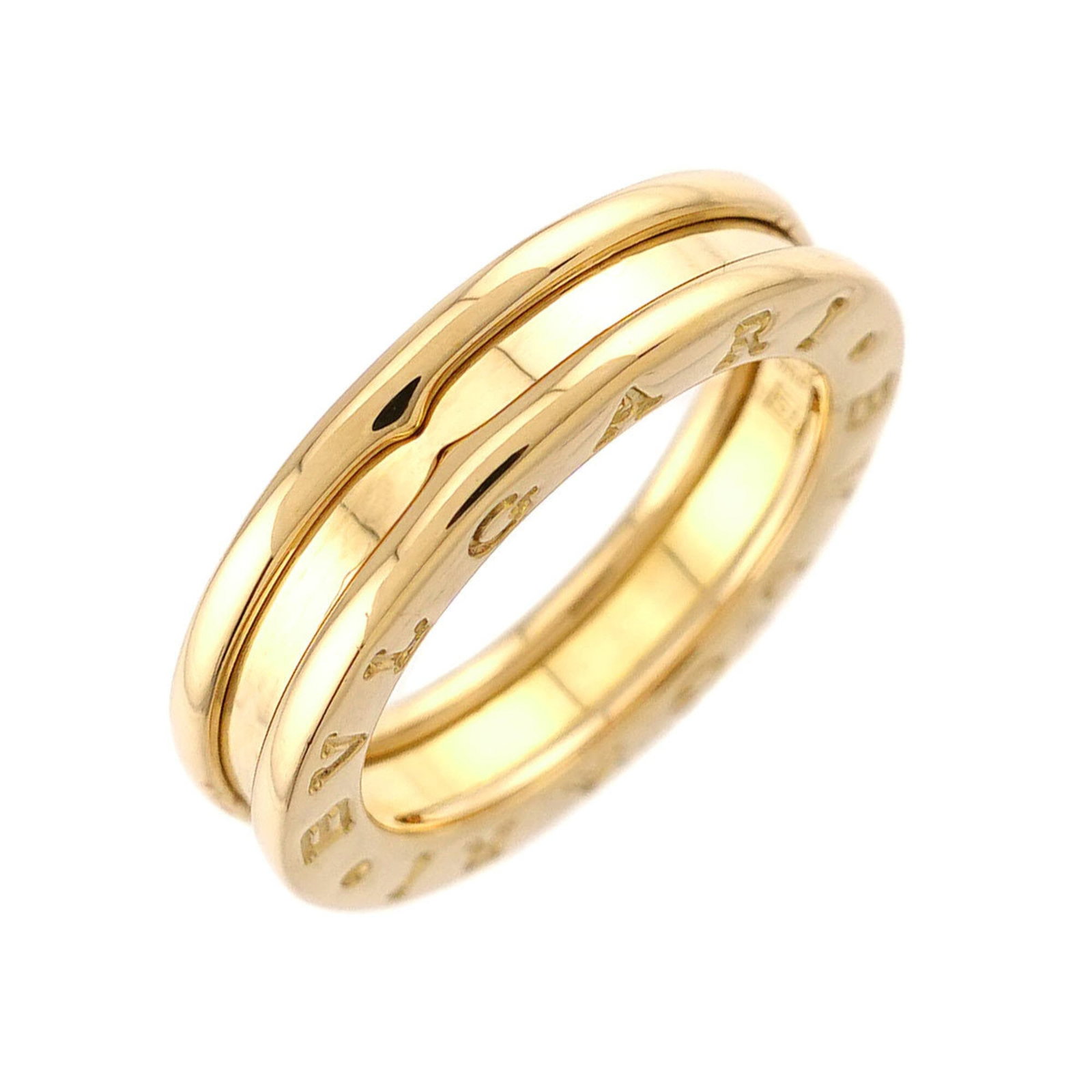 Bvlgari Band Ring Yellow Gold (18K): Bvlgari Band Ring Yellow Gold (18K) Bvlgari Band Ring Yellow Gold (18K) - A stunning yellow gold band ring from the renowned Italian luxury brand, Bvlgari. This 18K gold piece boasts a sleek design