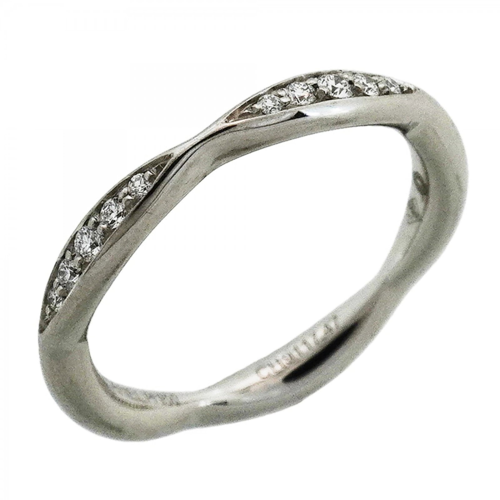 Ring in platinum 950 by Chanel: Ring in platinum 950 by Chanel Platinum band ring with diamond stone, designed by Chanel. This 47 US size 4 ring features a high-quality platinum construction and a prominent diamond accent. A