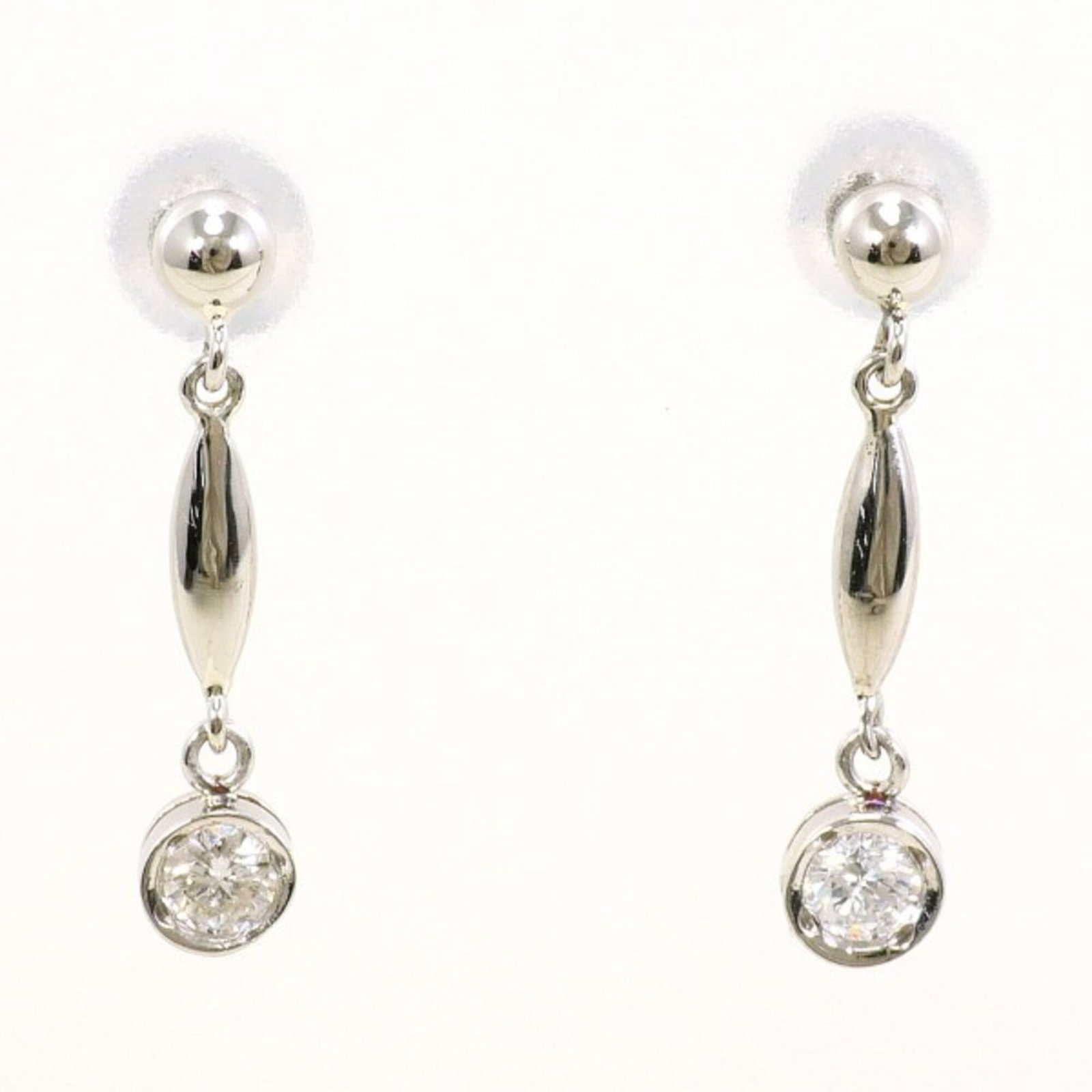 Earrings Platinum Drop Unbranded: Earrings Platinum Drop Unbranded Made from high-quality platinum, these drop earrings boast a sleek and modern design. Featuring a diamond stone weighing 0.08 carats, they add a touch of elegance to