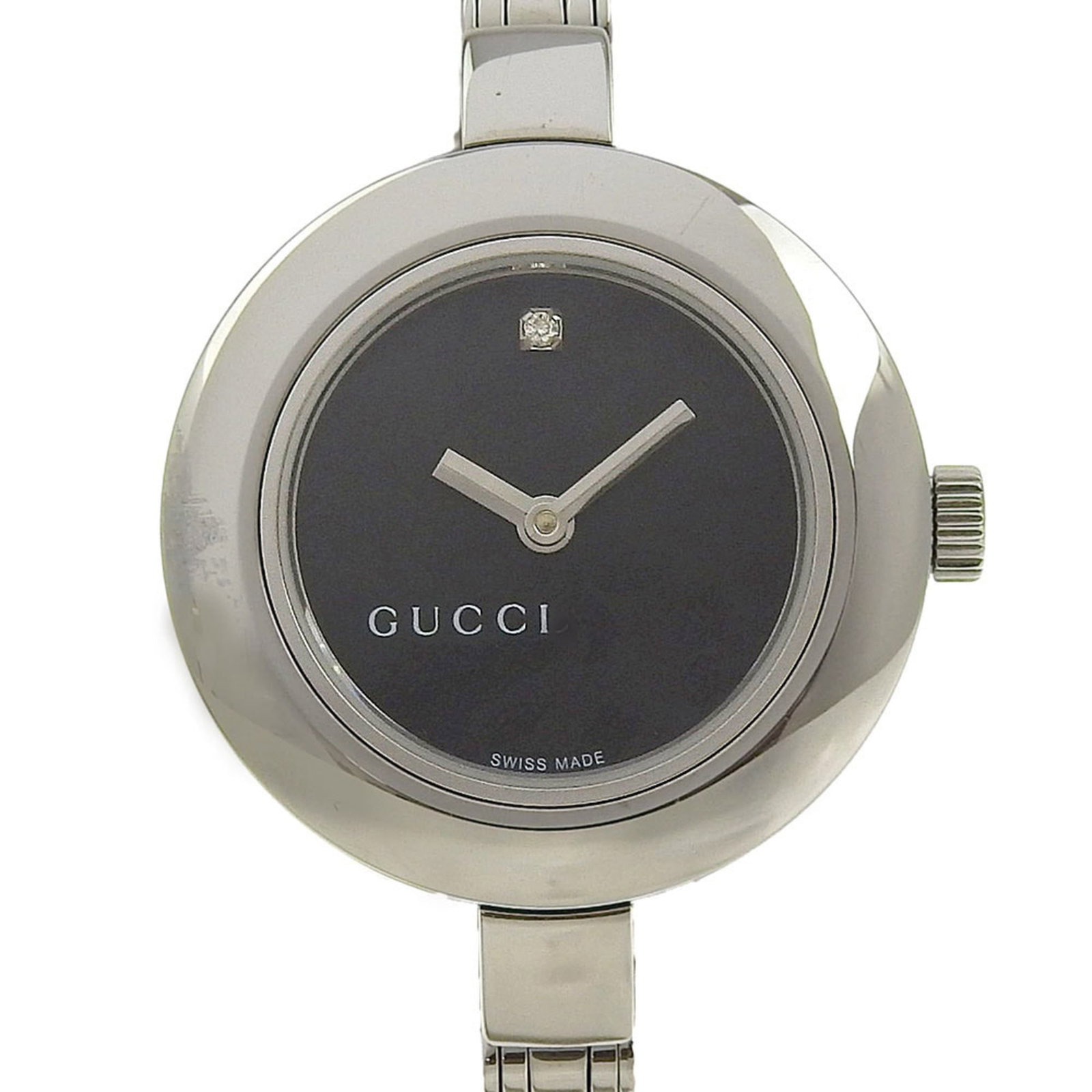 Gucci Wristwatch: Gucci Wristwatch Stainless steel case and band provide a sleek, modern look for women's wrists. The black dial features a quartz movement, keeping time with precision and reliability. This Gucci
