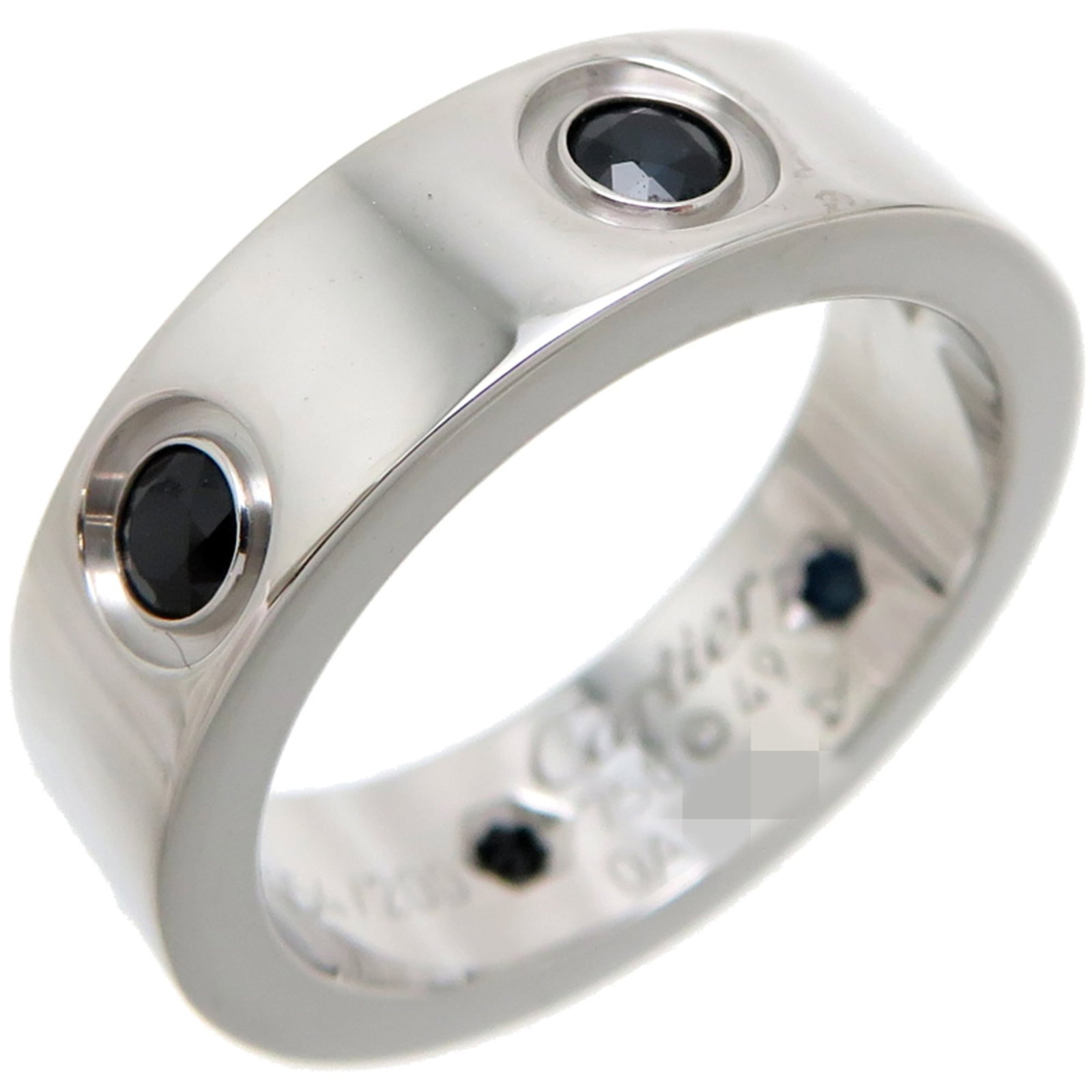 White Gold Ring Cartier Band: White Gold Ring Cartier Band White gold ring band from Cartier's Love model, featuring black sapphire and 18K white gold construction. The sleek design boasts a slim width of 5.5mm and an inner