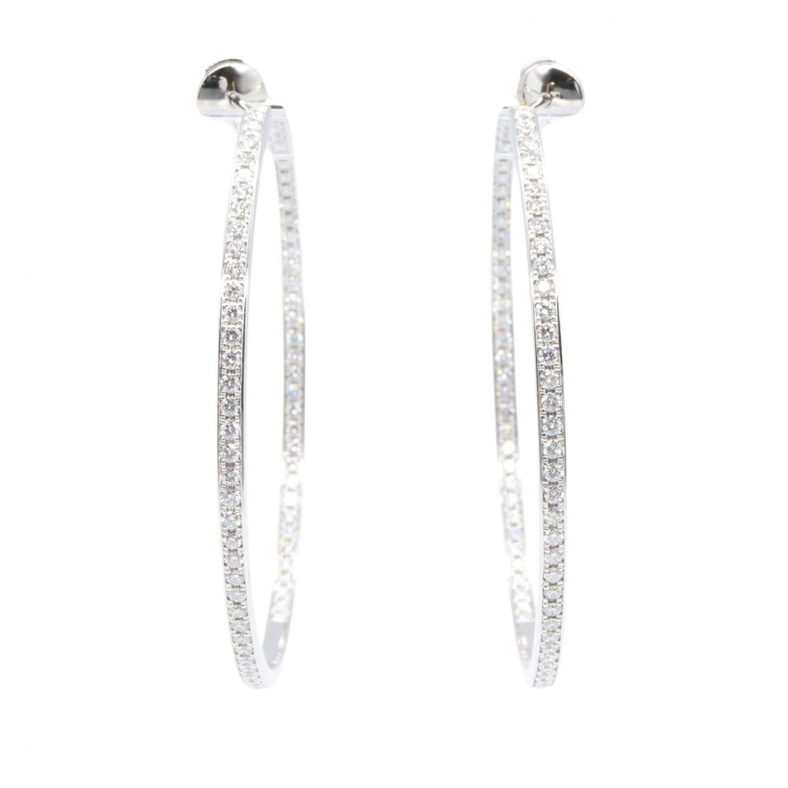 Gold Cartier Stud White Earrings: Gold Cartier Stud White Earrings Cartier's signature white gold (18K) stud earrings feature clear, silver stones and bear the hallmark of the renowned luxury brand. The diamonds add a touch of eleganc