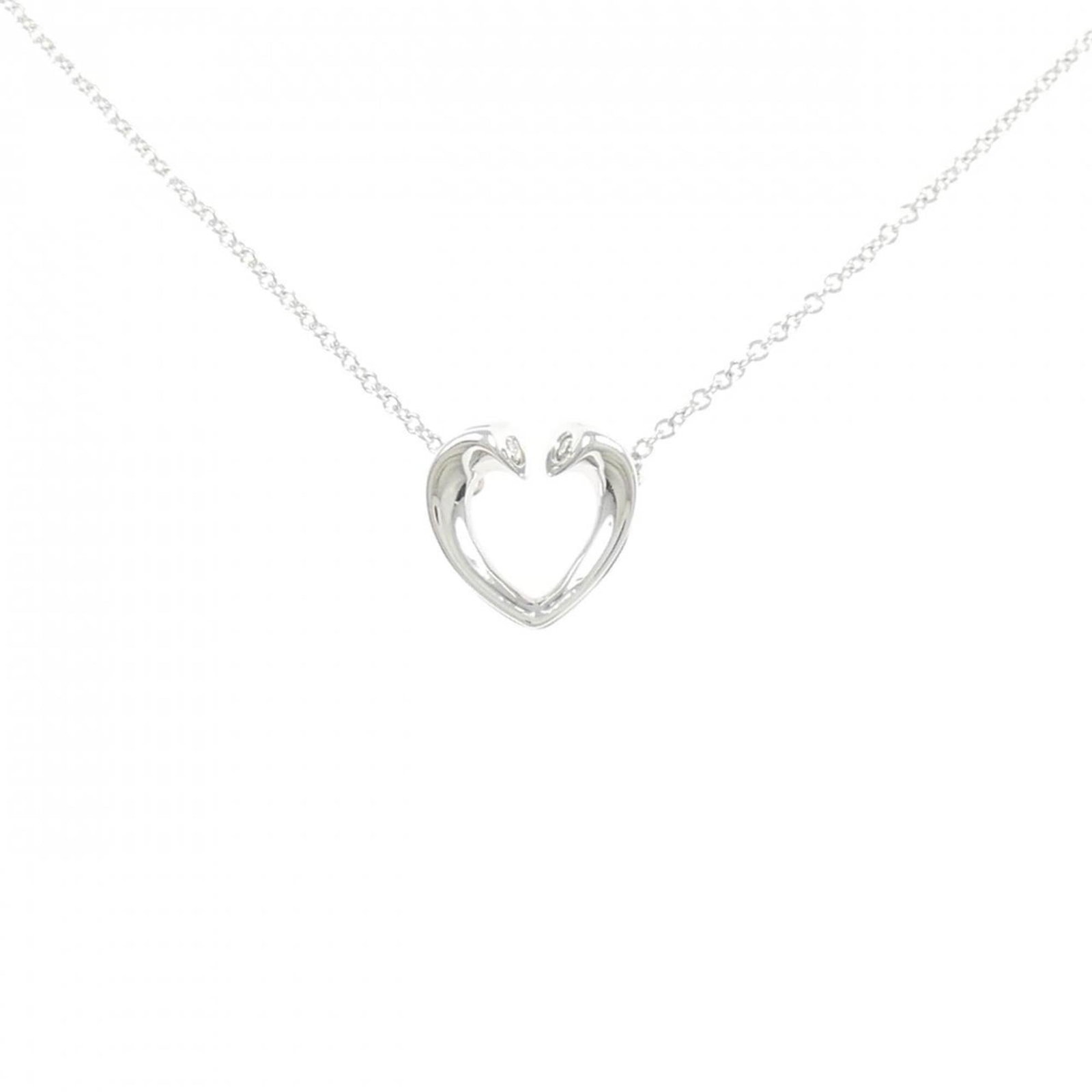 Tiffany Tenderness Necklace: Tiffany Tenderness Necklace Tiffany Tenderness Necklace features a stunning white gold (18K) pendant adorned with a diamond, set in a sleek design. The necklace boasts a classic look and feel, with a