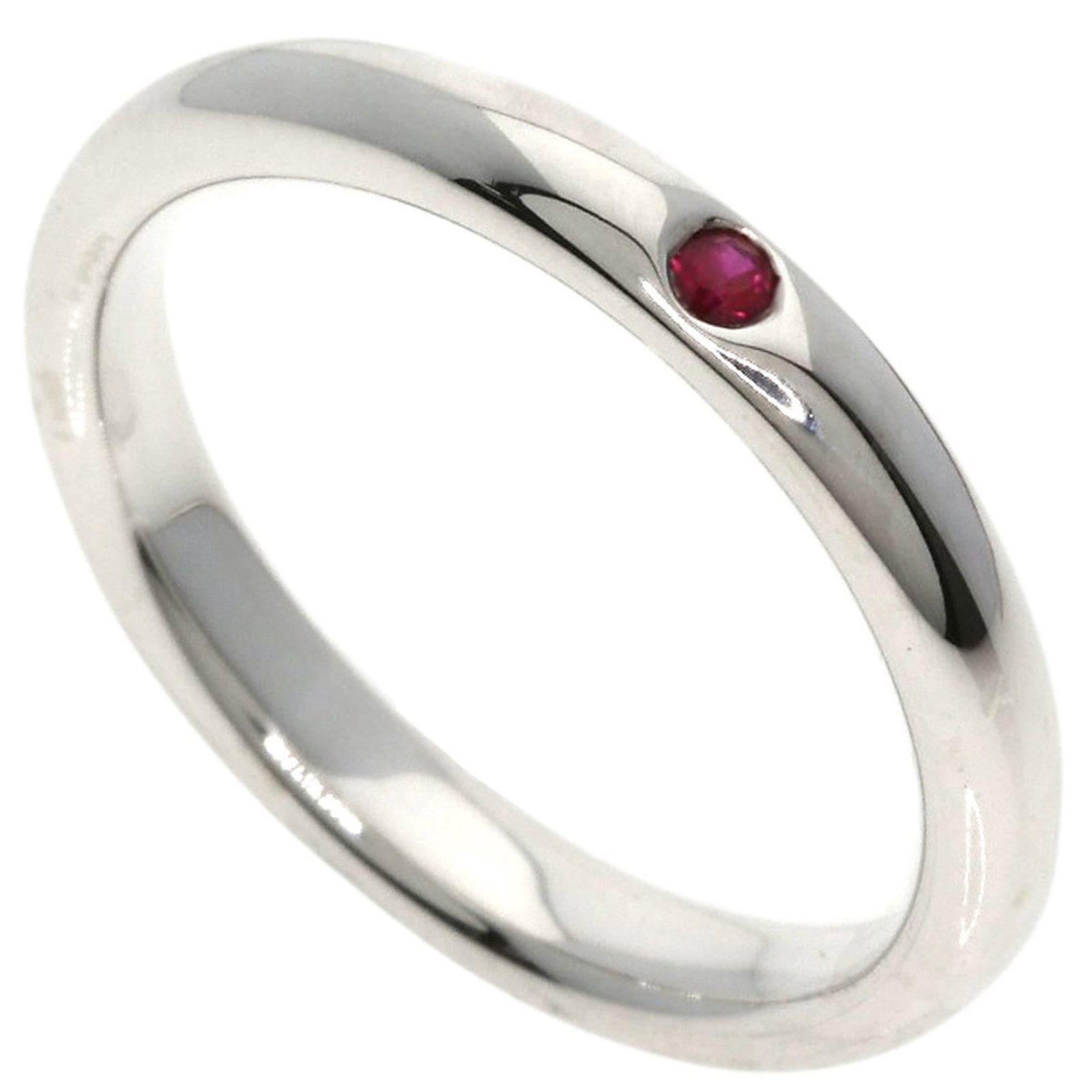 Silver Tiffany Band Ring: Silver Tiffany Band Ring Silver Tiffany Band Ring features a stunning ruby stone set in a sleek silver band, available in US size 5 and JP size 9. This elegant ring showcases the iconic Tiffany