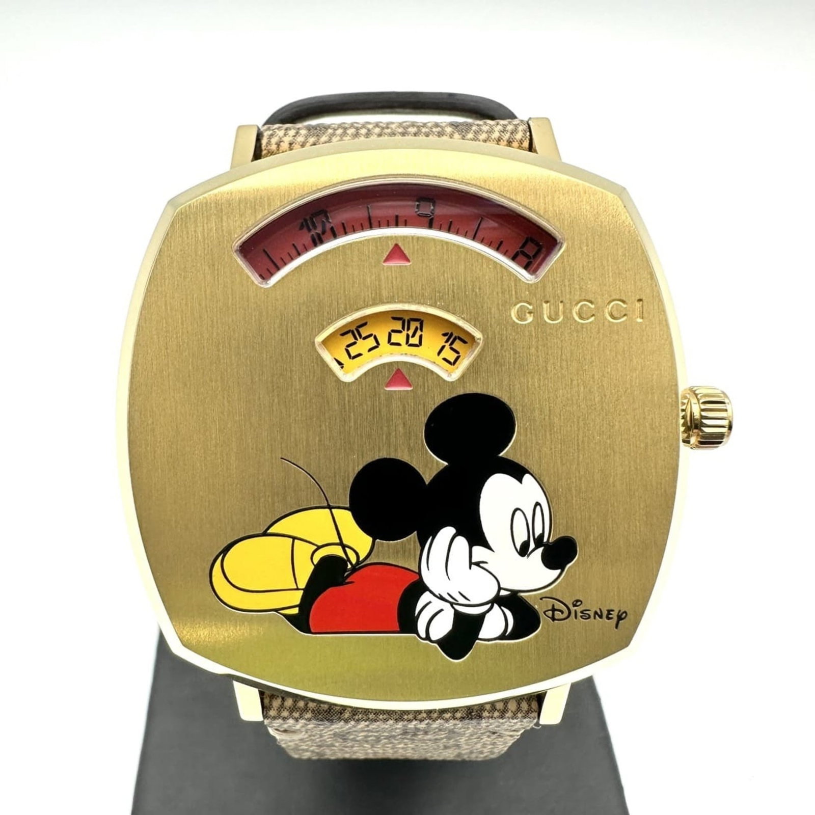 Gucci Wristwatch: Gucci Wristwatch Stainless steel case with gold finish, featuring a 35mm diameter and 6.5mm thickness, paired with a quartz movement and 22mm wide band. Includes inner and outer boxes for storage. A s