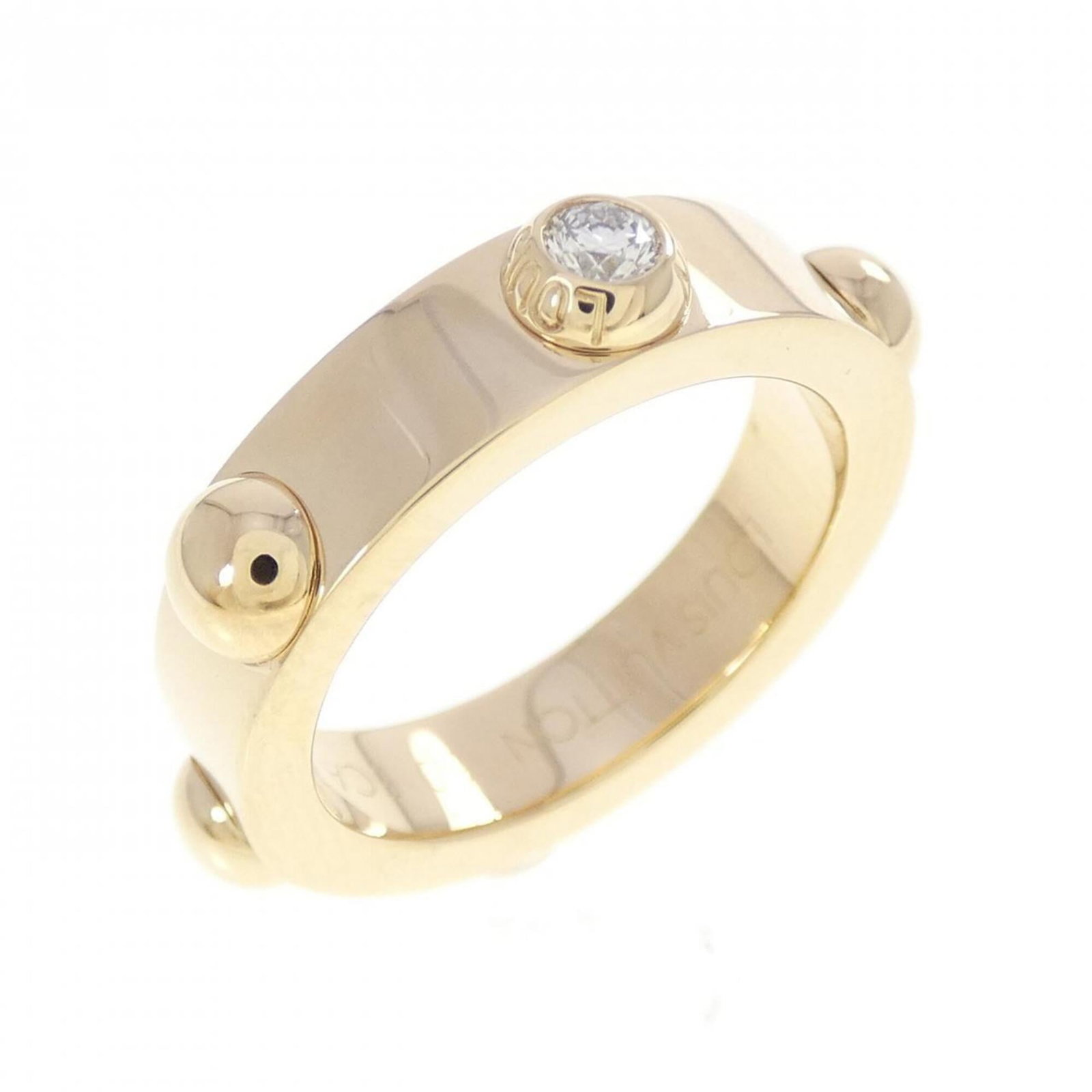 Louis Vuitton Band Ring Yellow Gold (18K): Louis Vuitton Band Ring Yellow Gold (18K) Yellow gold (18K) band ring from Louis Vuitton, featuring a diamond stone. This women's ring boasts a sleek design with the iconic brand's signature style. Th