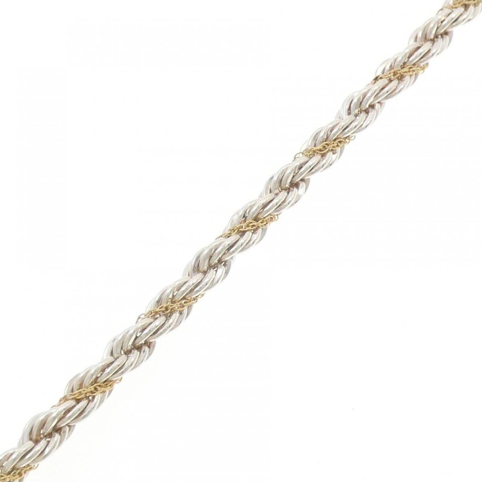 Charm Bracelet 925 Silver 18K Yellow Gold: Charm Bracelet 925 Silver 18K Yellow Gold Charm bracelet made from 925 silver and adorned with 18K yellow gold, measuring 18.5cm in length. This Tiffany-designed charm bracelet combines the elegance