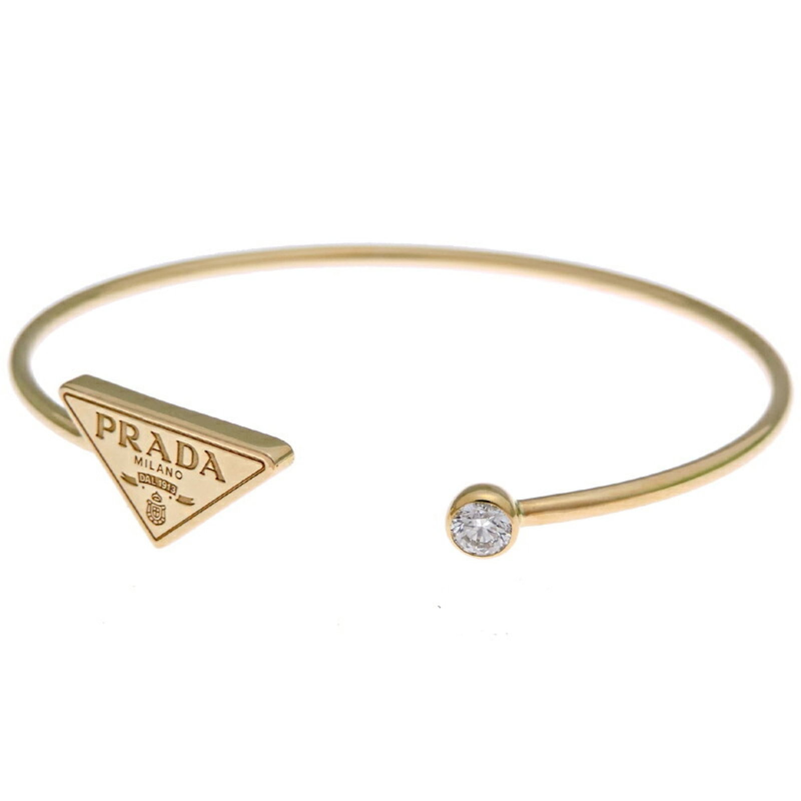 Prada Charm Bracelet Yellow Gold (18K): Prada Charm Bracelet Yellow Gold (18K) Yellow gold (18K) Prada Charm Bracelet with a diamond stone, presented in a box and accompanied by a guarantee card. This elegant charm bracelet features 14.5cm