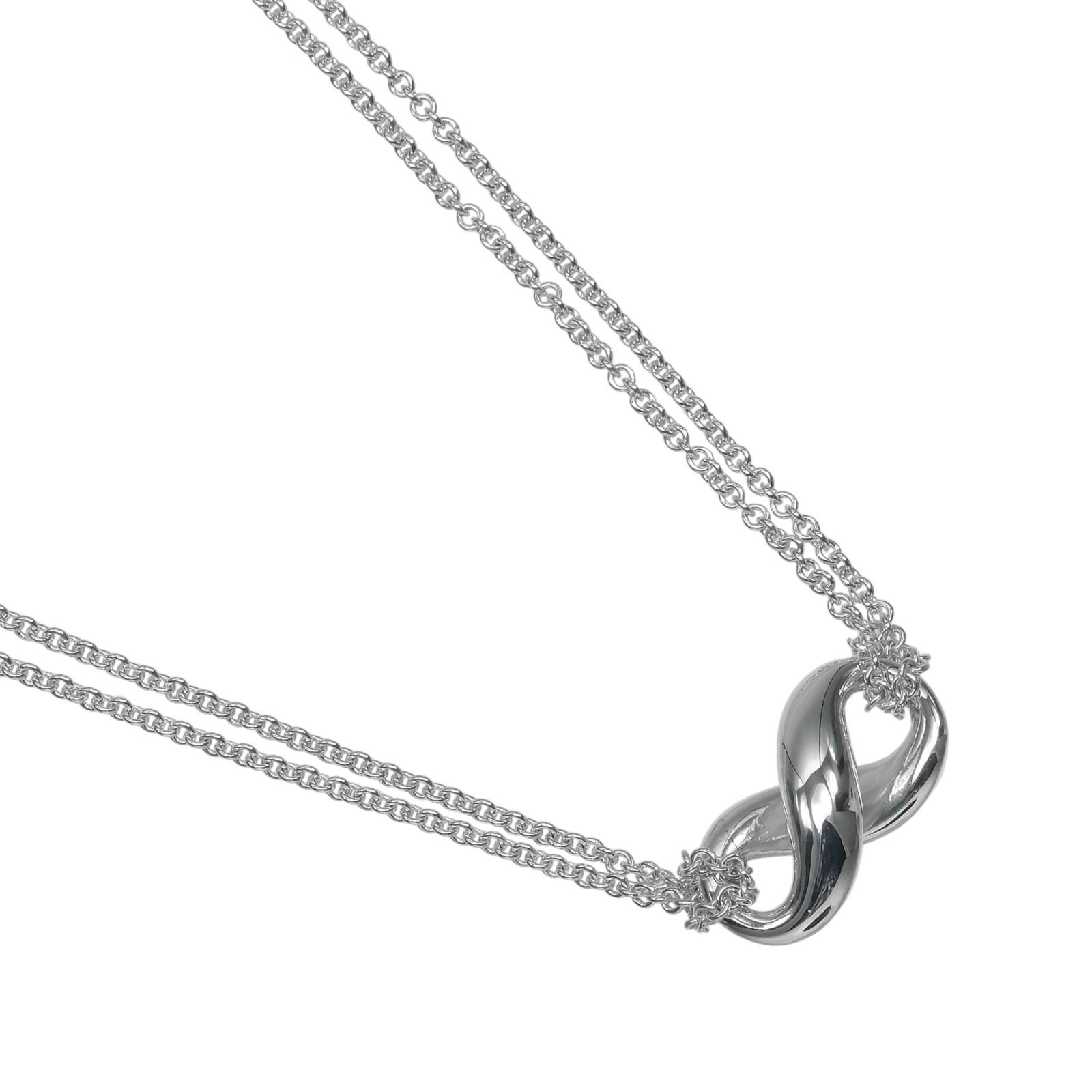 Tiffany & Co. Infinity Double Chain Necklace Sterling Silver 925 Approx. 7.84G: Tiffany & Co. Infinity Double Chain Necklace Sterling Silver 925 Approx. 7.84G Sterling silver necklace from Tiffany & Co. features an Infinity Double Chain design, showcasing the brand's signature