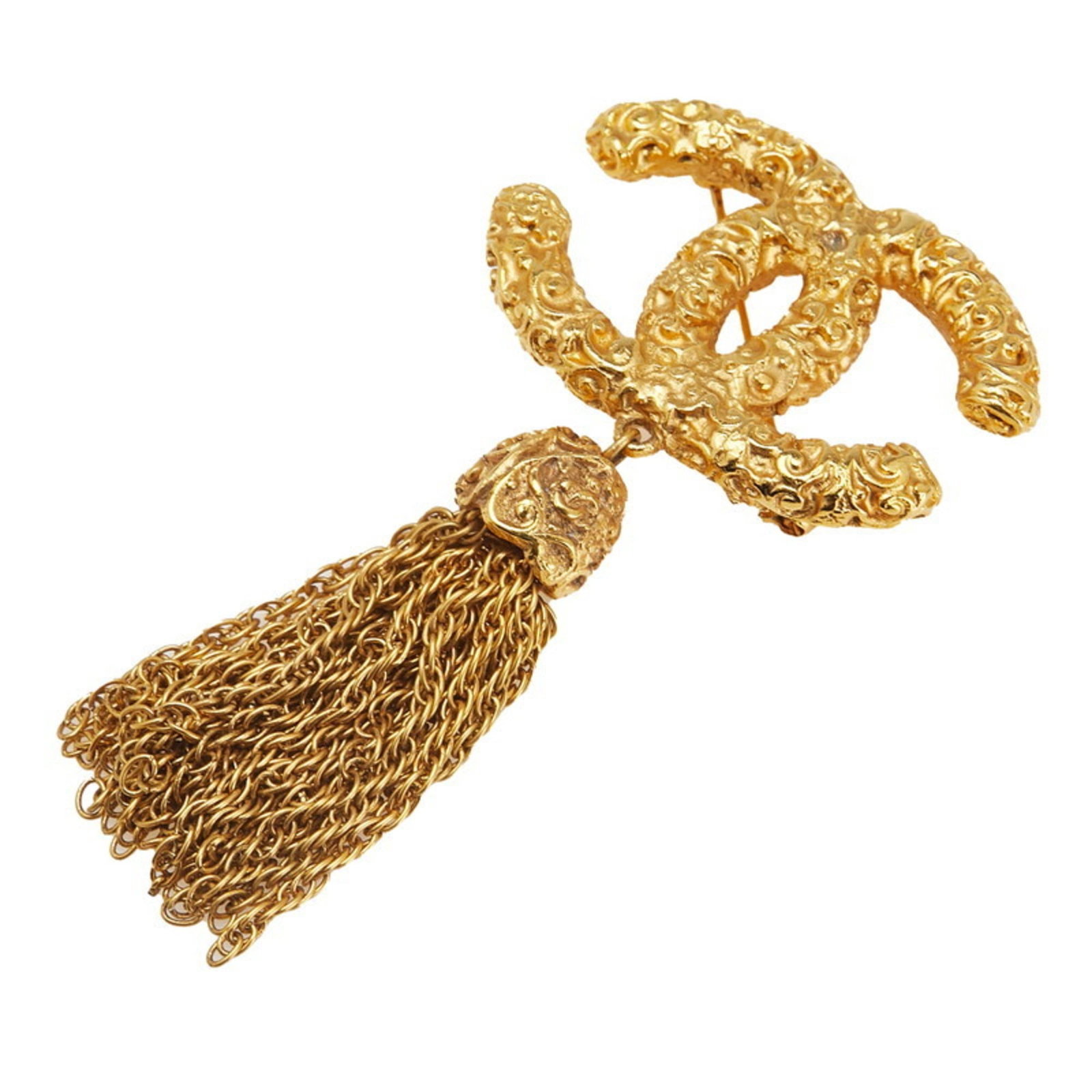 Chanel Brooch Gold Plating: Chanel Brooch Gold Plating Chanel's iconic Cocomark Lava Tassel brooch is showcased in gold plating, adding a touch of luxury to any outfit. This vintage piece features a striking design with a