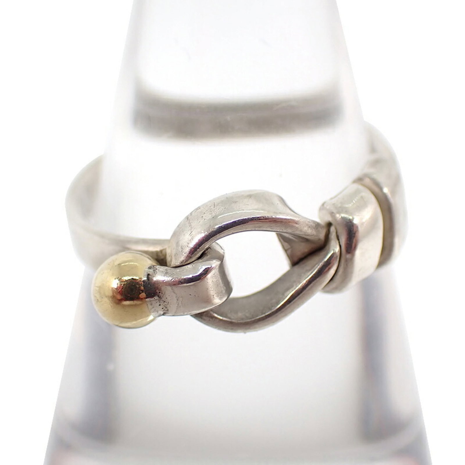 Sterling Silver 925 Yellow Gold Ring By Tiffany: Sterling Silver 925 Yellow Gold Ring By Tiffany Sterling silver 925 and yellow gold (18K) come together in this elegant band ring from Tiffany. The 52 US size, 6.5 fit makes it a versatile choice for