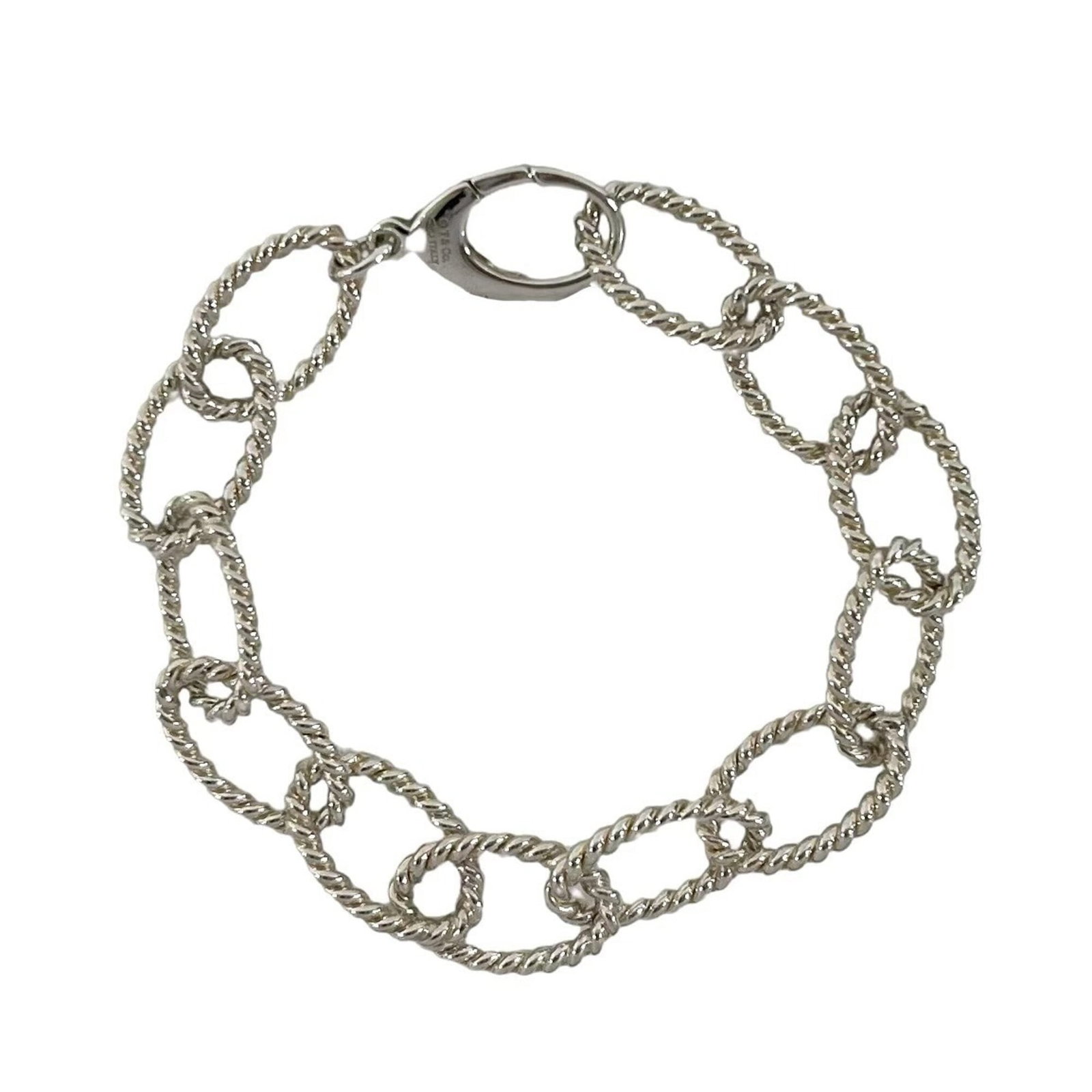 Charm bracelet silver 925: Charm bracelet silver 925 Silver 925 Charm Bracelet. This charm bracelet features a silver 925 material, measuring 17.5cm in length. The item bears a Tiffany brand and type designation. Item Specifics