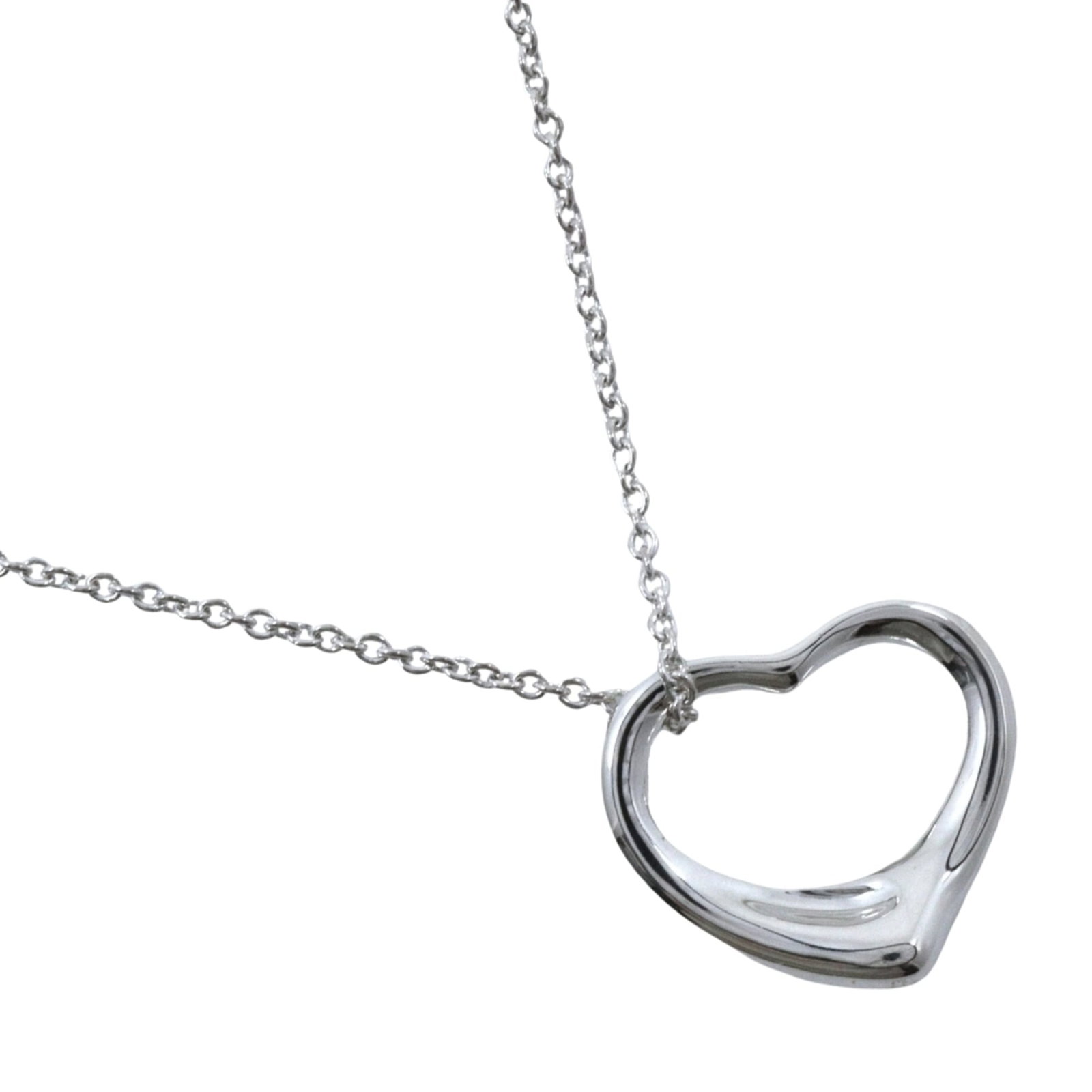 Tiffany & Co. Orpin Heart Necklace Designed By Elsa Peretti 925 Sterling Silver Approx. 2.7G For: Tiffany & Co. Orpin Heart Necklace Designed By Elsa Peretti 925 Sterling Silver Approx. 2.7G For Tiffany & Co. Orpin Heart Necklace Designed By Elsa Peretti features a striking 13mm x 15mm pendant in