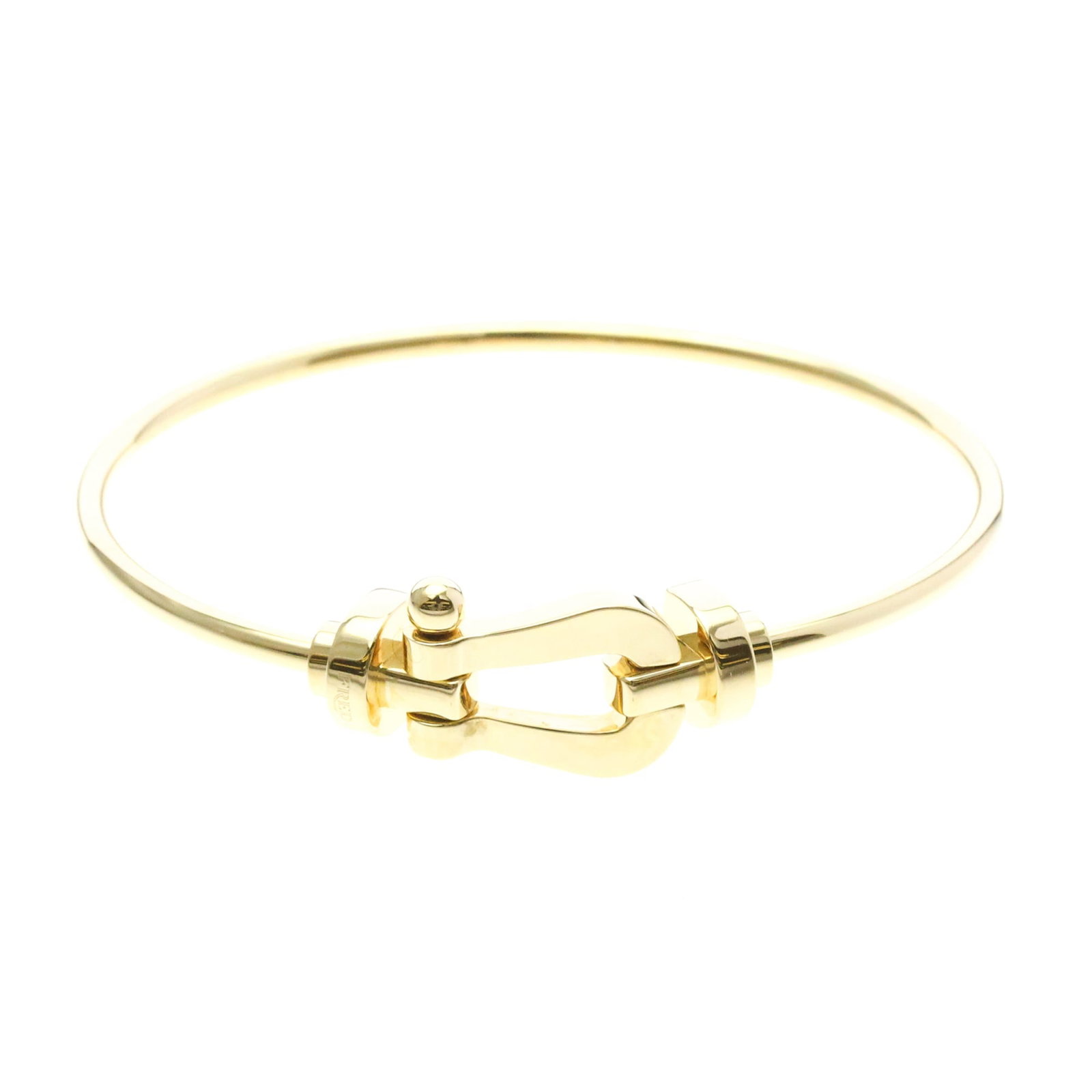 Fred Charm Bracelet Yellow Gold (18K): Fred Charm Bracelet Yellow Gold (18K) Yellow gold (18K) charm bracelet with a sleek, modern design. This 16-inch long, 2.5mm wide bracelet features no stone and weighs 15g. Made from high-quality 18K