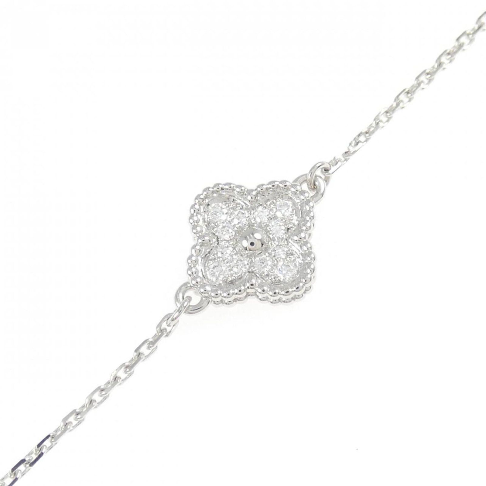 Van Cleef & Arpels Charm Bracelet White Gold (18K): Van Cleef & Arpels Charm Bracelet White Gold (18K) Van Cleef & Arpels Charm Bracelet White Gold (18K) boasts elegant sophistication with its white gold (18K) construction and delicate charm design,