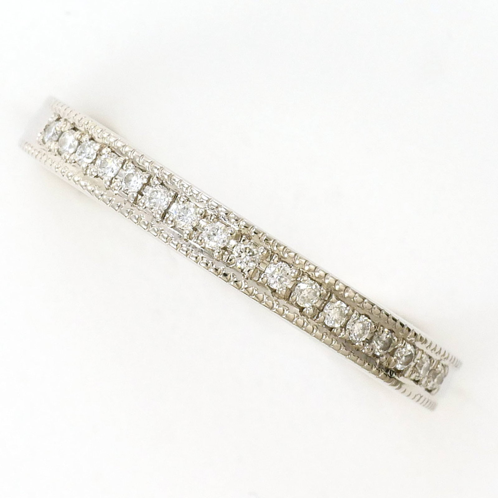 Ring Band Platinum Unbranded 900: Ring Band Platinum Unbranded 900 Platinum ring band with a diamond stone, weighing 0.07 carats, is crafted from platinum metal and features a US size 3.5 and JP size 5 fit. The item weighs 2.8g and