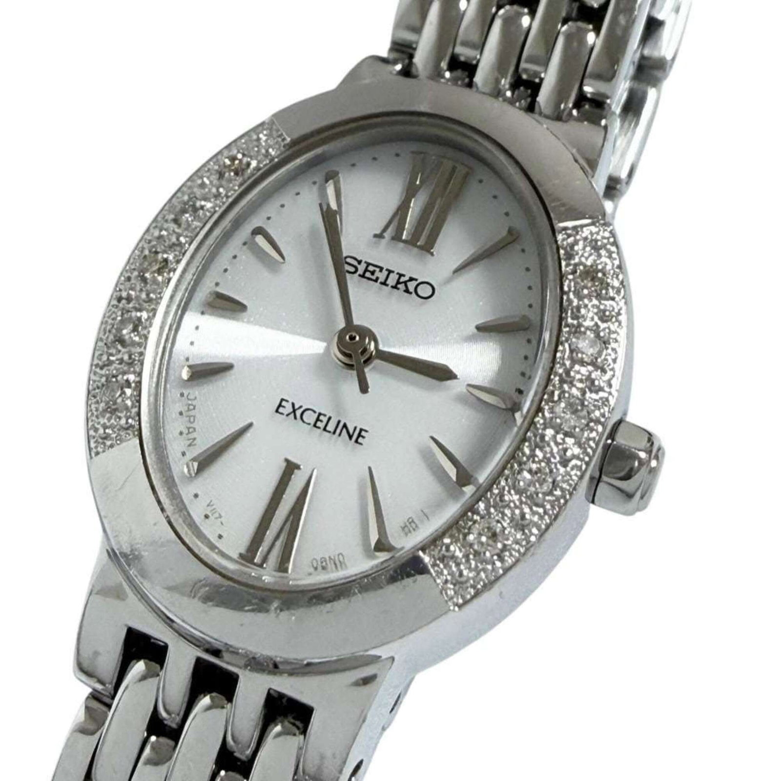 Wristwatch by Seiko: Wristwatch by Seiko Stainless steel case and band for a sleek, modern look. Powered by Seiko's solar movement, this watch is energy-efficient and eco-friendly. With its compact 19mm diameter and