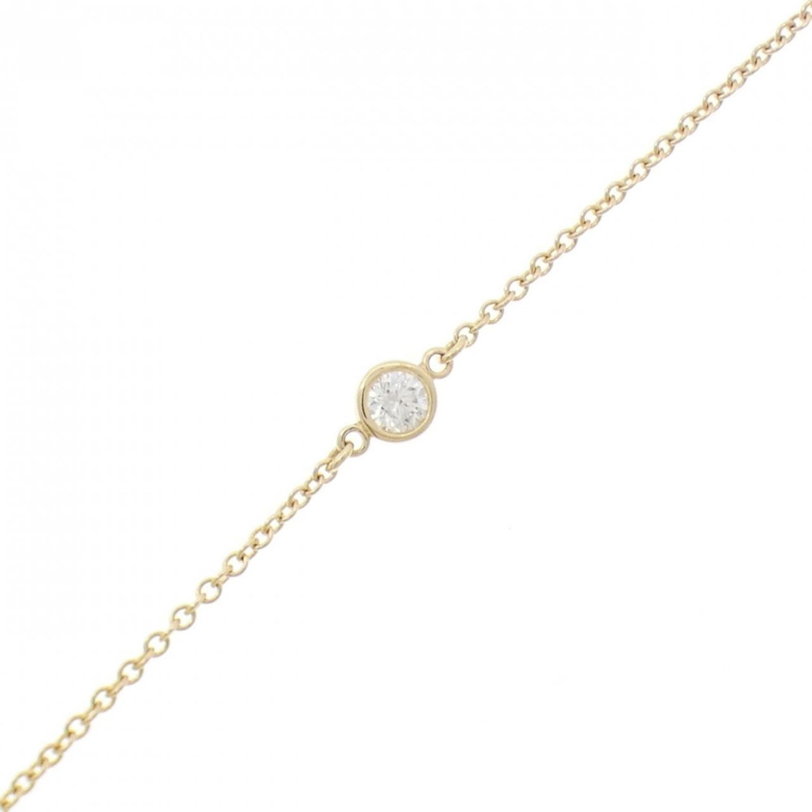 Tiffany Charm Bracelet Yellow Gold (18K): Tiffany Charm Bracelet Yellow Gold (18K) Yellow gold (18K) charm bracelet with a diamond stone, measuring 18cm in length. This elegant piece showcases the classic style of Tiffany & Co., featuring a t