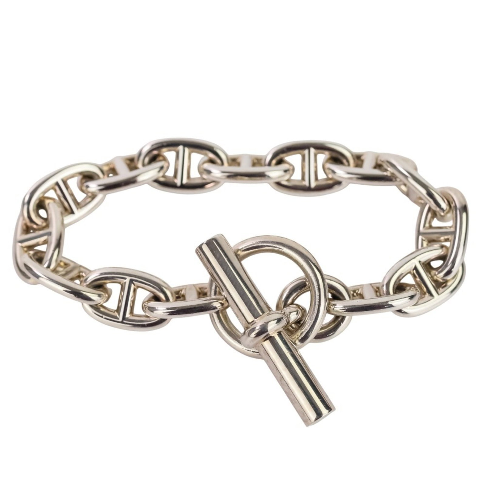 Charm Bracelet Silver 925 by Hermes: Charm Bracelet Silver 925 by Hermes Silver 925 Charm Bracelet by Hermes features a sleek design with a total length of 19cm and a weight of 51g. The bracelet's width measures 1.7cm, making it comforta