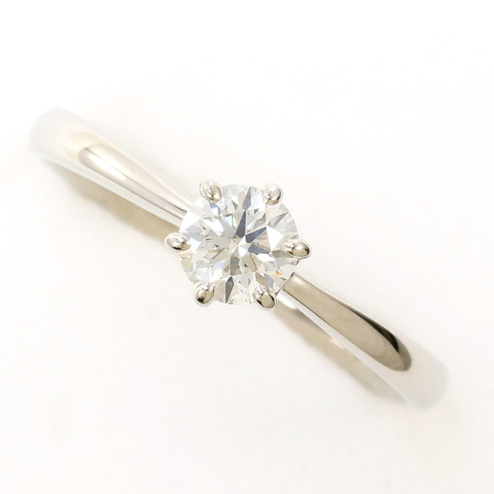 Ring Band Platinum Unbranded 900: Ring Band Platinum Unbranded 900 Platinum band ring with a 0.330 carat diamond, available in US size 6 and Japanese size 11, featuring a sleek 5mm width design. Made from high-quality platinum metal, 