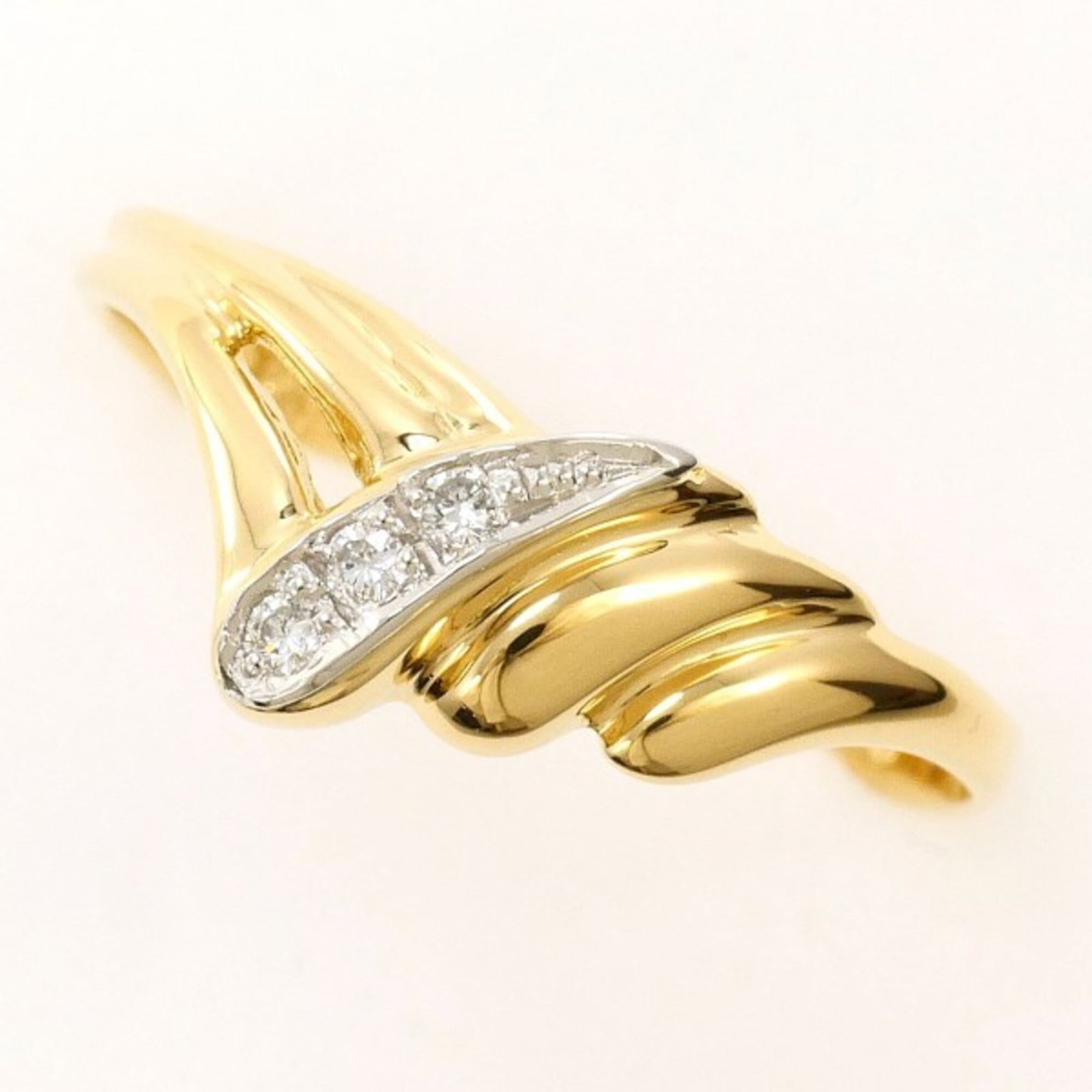 White Gold 18K Yellow Gold Unbranded Ring Band: White Gold 18K Yellow Gold Unbranded Ring Band White gold 18K yellow gold unbranded ring band features a 0.03ct diamond set in an elegant design, with a 7mm width and US size 11 fit. Made from