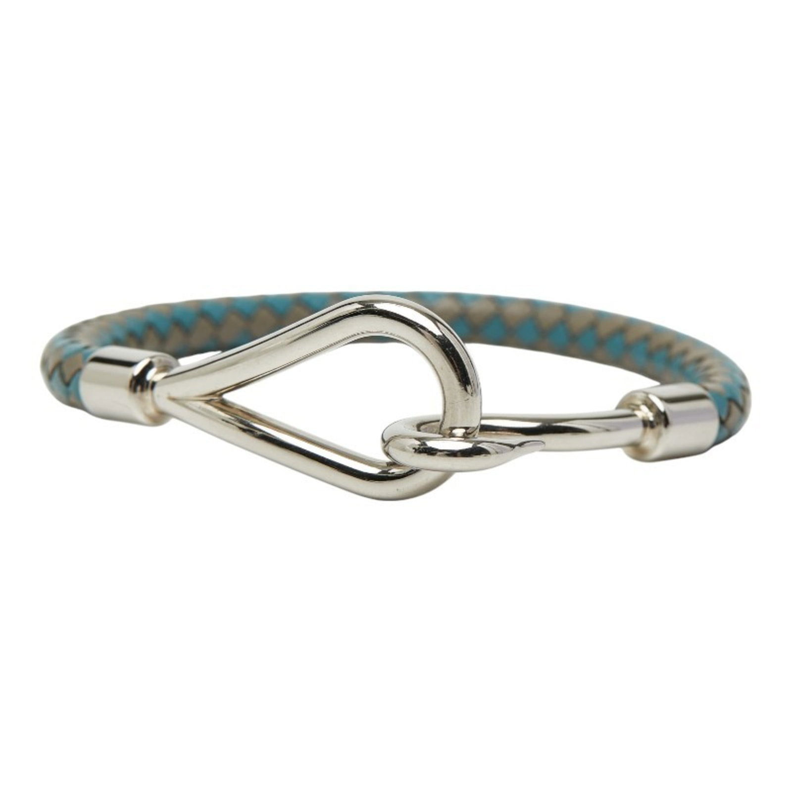 Metal leather bracelet charm by Hermes: Metal leather bracelet charm by Hermes Blue gray, silver metal leather bracelet with a charm by Hermes measures 15.5cm in length. This charm bracelet features high-quality materials and a classic desi