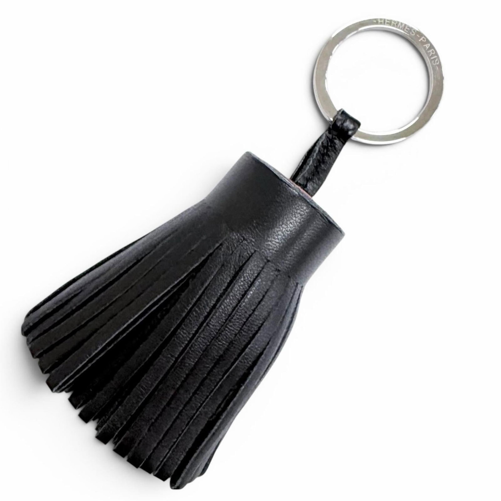Hermes agneau handbag charm Milo: Hermes agneau handbag charm Milo Agneau Milo handbag charm from Hermes features black and rouge hues, showcasing the brand's signature style. Made from high-quality agneau material, this charm adds a